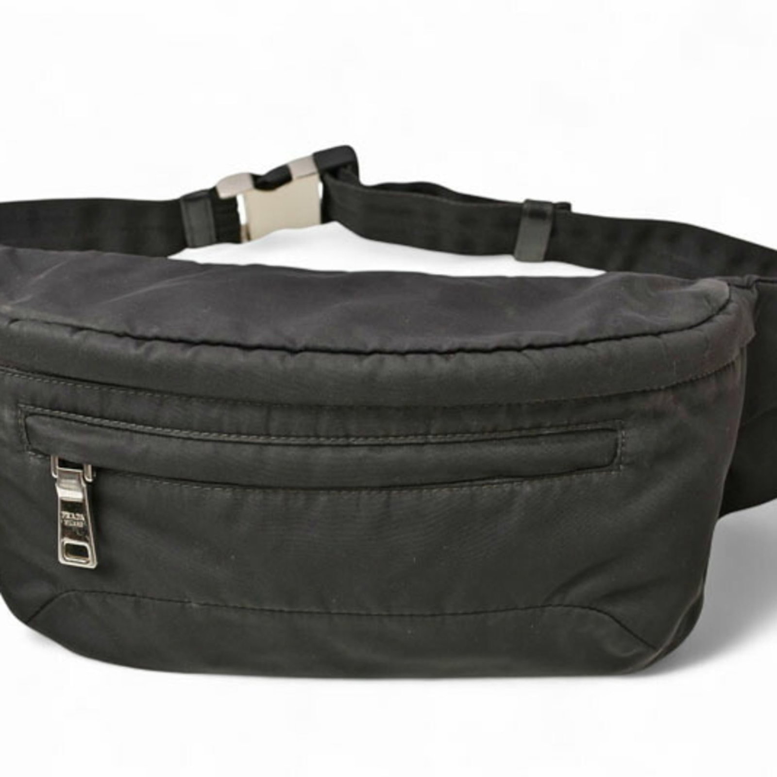 Pouch Nylon Fanny Pack Prada: Pouch Nylon Fanny Pack Prada The Prada Pouch Nylon Fanny Pack is a sleek and versatile accessory, featuring a durable nylon material and a classic black color. Measuring 13cm x 29cm x 8cm, it has a