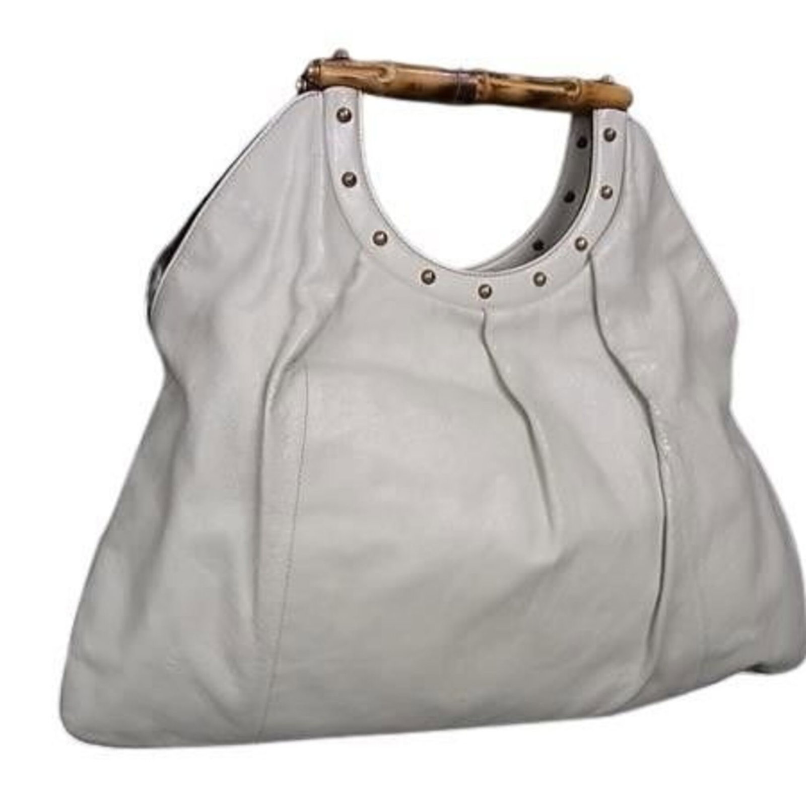 Handbag Leather Gucci: Handbag Leather Gucci Ivory Gucci handbag with classic design, made from high-quality leather, and measuring 30cm x 47cm x 9.5cm. This Italian-made handbag is a stylish accessory for women, with a