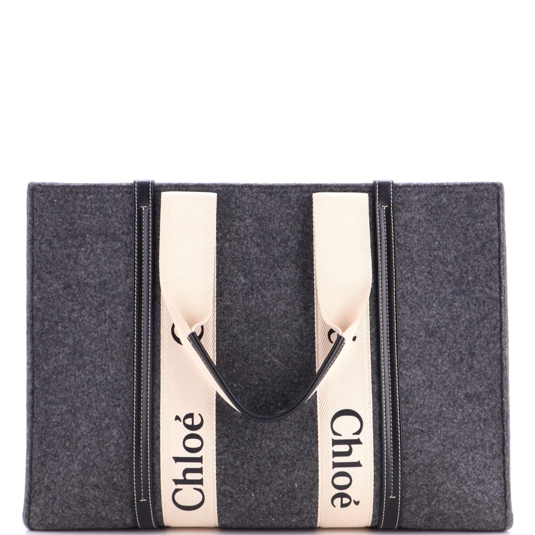 Large Chloe Woody Recycled Felt Tote Canvas Leather: Large Chloe Woody Recycled Felt Tote Canvas Leather Large Chloe Woody Recycled Felt Tote Canvas Leather features a unique combination of recycled felt, leather, and canvas materials. The gray exterior