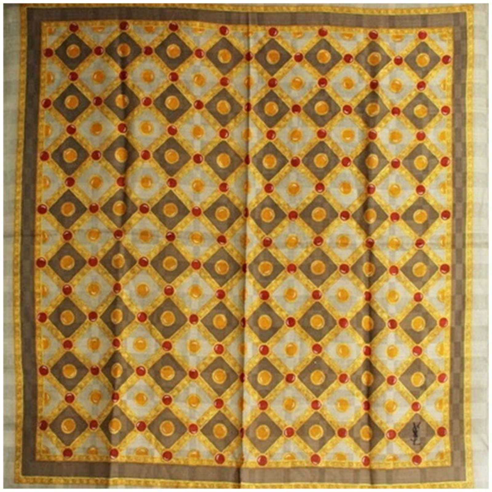 Yves Saint Laurent Silk Wool Scarf: Yves Saint Laurent Silk Wool Scarf Silk and wool blend creates a luxurious texture in this Yves Saint Laurent scarf, available in three earthy tones. The scarf's wool and silk material provides a comf