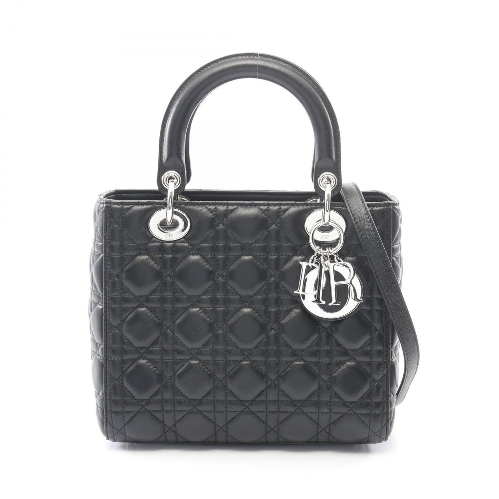 Handbag Leather Dior Christian: Handbag Leather Dior Christian This black leather handbag from Christian Dior measures 20cm x 24cm x 11cm and features a classic design. Made from high-quality leather, its sleek silhouette makes it