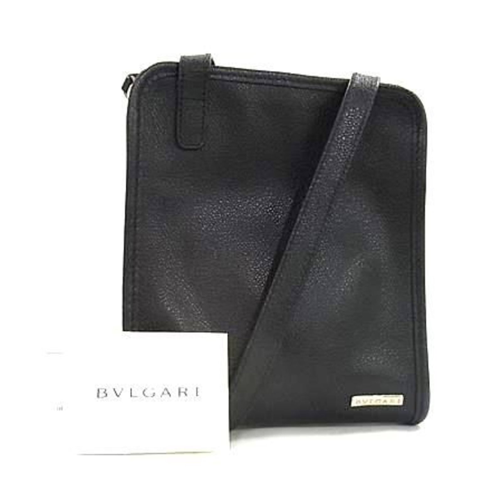 Handbag Bvlgari Leather Tote Bag: Handbag Bvlgari Leather Tote Bag Bvlgari Leather Tote Bag, crafted from high-quality Italian leather, features a sleek black design with a classic shape and size. Measuring 19cm x 16cm x 3cm, this
