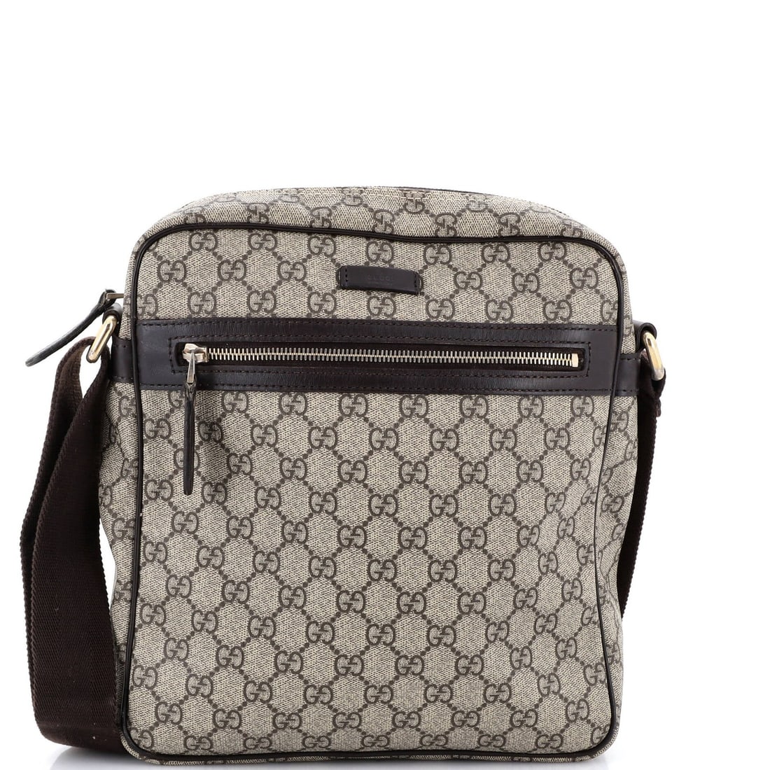 Front Zip Messenger Coated Canvas Medium Gucci: Front Zip Messenger Coated Canvas Medium Gucci This Gucci front zip messenger bag boasts a classic cross body design with a medium size and GG coated canvas exterior in rich brown. The exterior