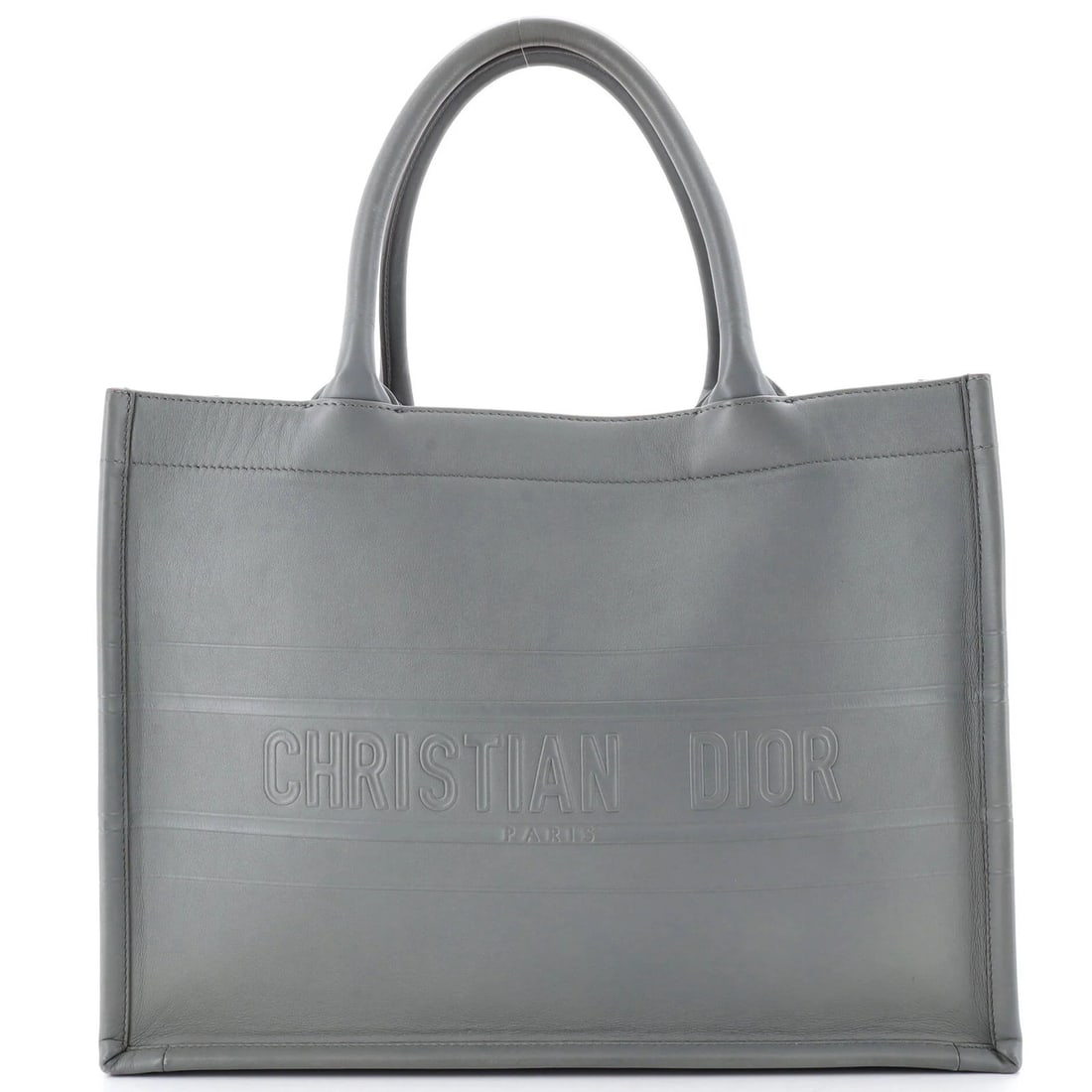 Christian Dior Book Tote Medium Leather Embossed: Christian Dior Book Tote Medium Leather Embossed Medium Leather Embossed Book Tote from Christian Dior, featuring a classic design with a gray exterior and interior, and a sturdy handle drop of 6.5".