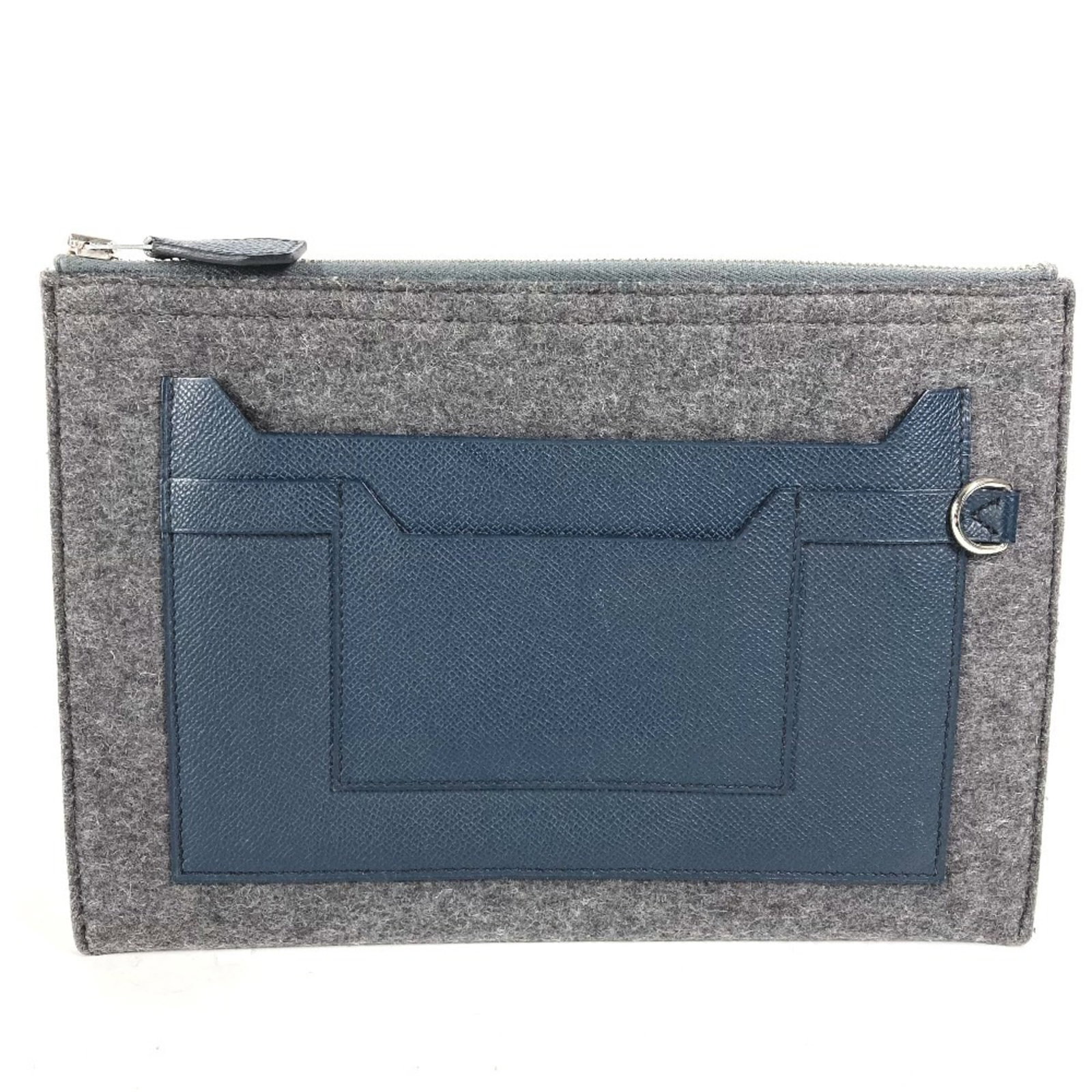 Leather Felt Bag Pouch Clutch Hermes: Leather Felt Bag Pouch Clutch Hermes The Hermes Leather Felt Bag Pouch Clutch is a unique, bicolor design featuring gray and navy hues. Made from high-quality felt and leather, this clutch boasts a