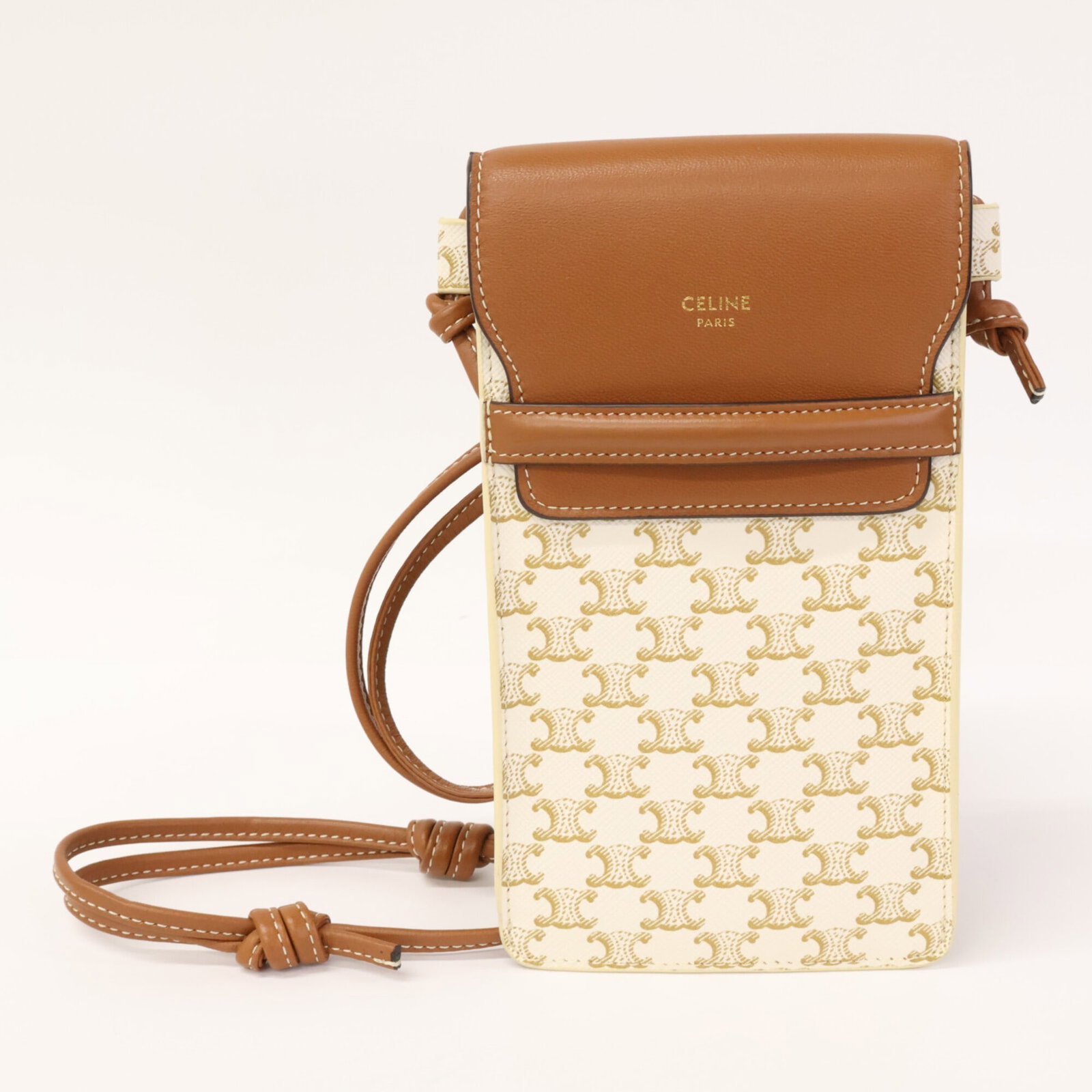 Celine Leather Shoulder Bag: Celine Leather Shoulder Bag Brown and White Celine Leather Pouch Shoulder Bag. This Celine leather shoulder bag features a classic design with a 17.5cm x 9.5cm x 2cm size. Made from high-quality