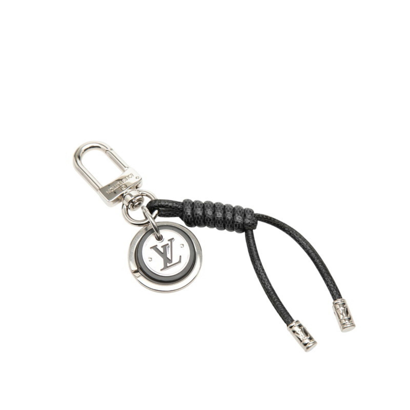 Graphite Damier Keyring Vuitton Louis: Graphite Damier Keyring Vuitton Louis Damier Graphite, a timeless and iconic pattern, is featured on this Louis Vuitton keyring, crafted from high-quality Damier Graphite material. The sleek design