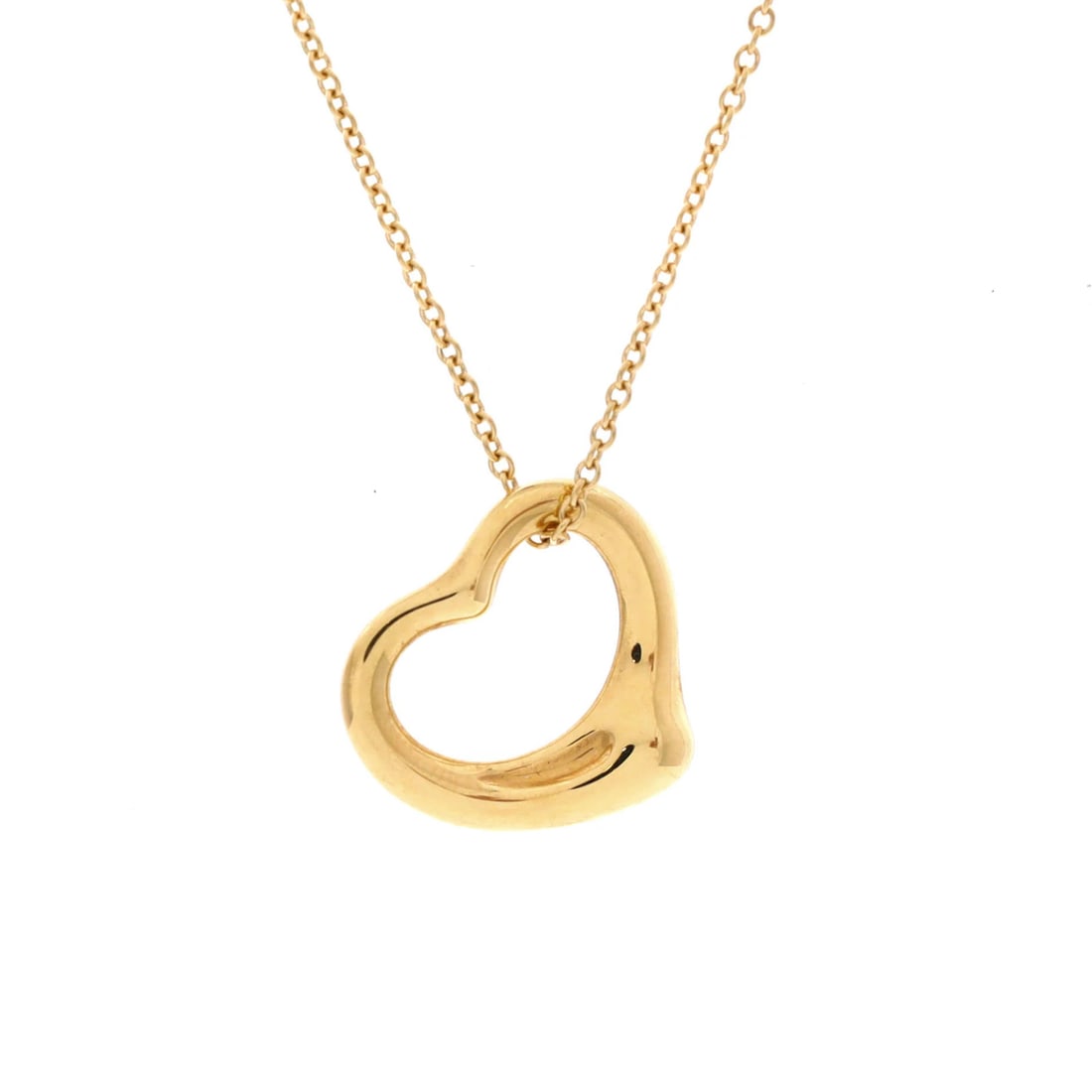 Tiffany & Co. Elsa Peretti Open Heart Pendant Necklace 18K Yellow Gold 16mm: Tiffany & Co. Elsa Peretti Open Heart Pendant Necklace 18K Yellow Gold 16mm Tiffany & Co.'s iconic Elsa Peretti Open Heart Pendant Necklace is a timeless piece of 18K yellow gold jewelry. This 16mm