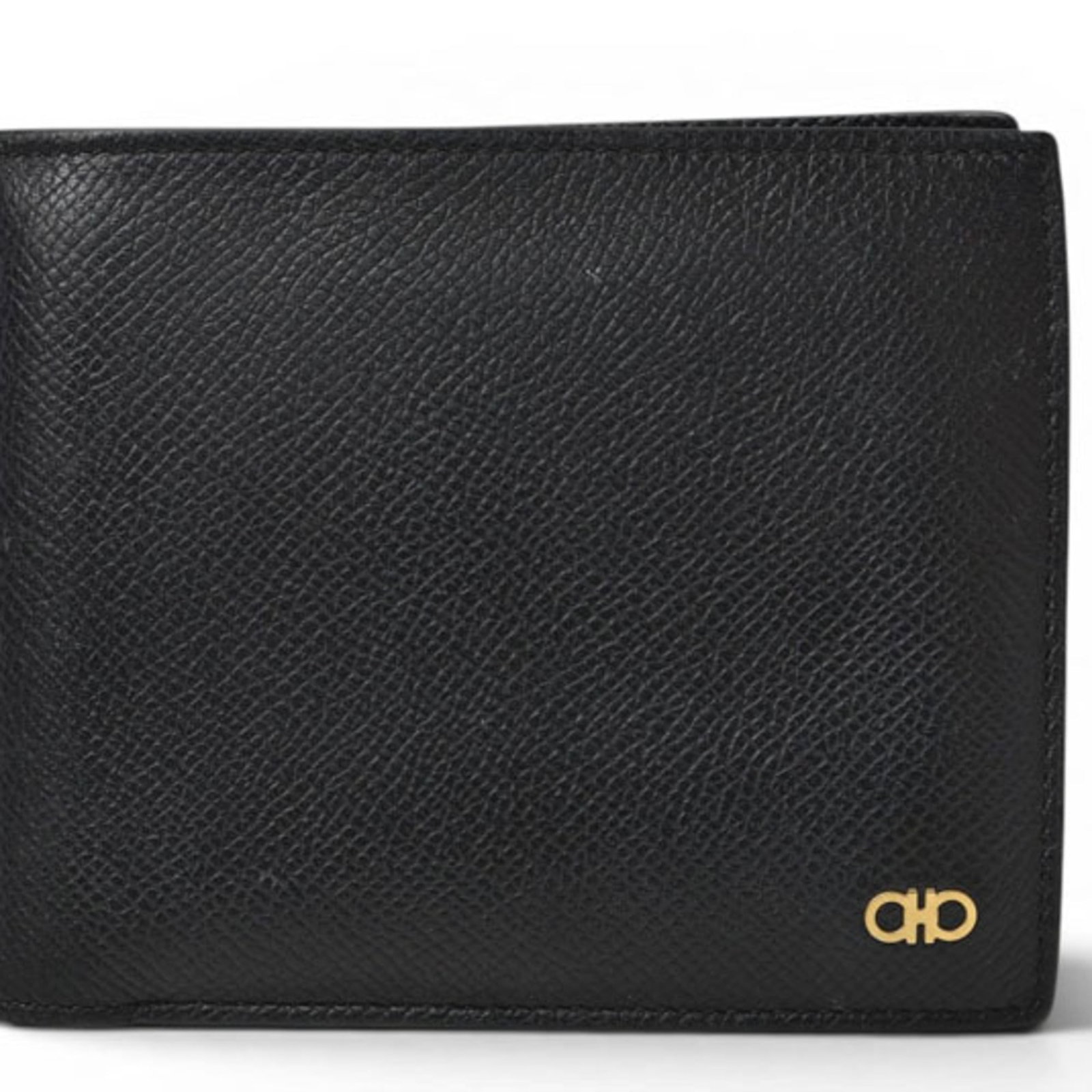 Salvatore Ferragamo Leather Wallet Bi-Fold: Salvatore Ferragamo Leather Wallet Bi-Fold The Salvatore Ferragamo Leather Wallet Bi-Fold is a sleek and sophisticated accessory, crafted from high-quality black leather. Its classic bi-fold design