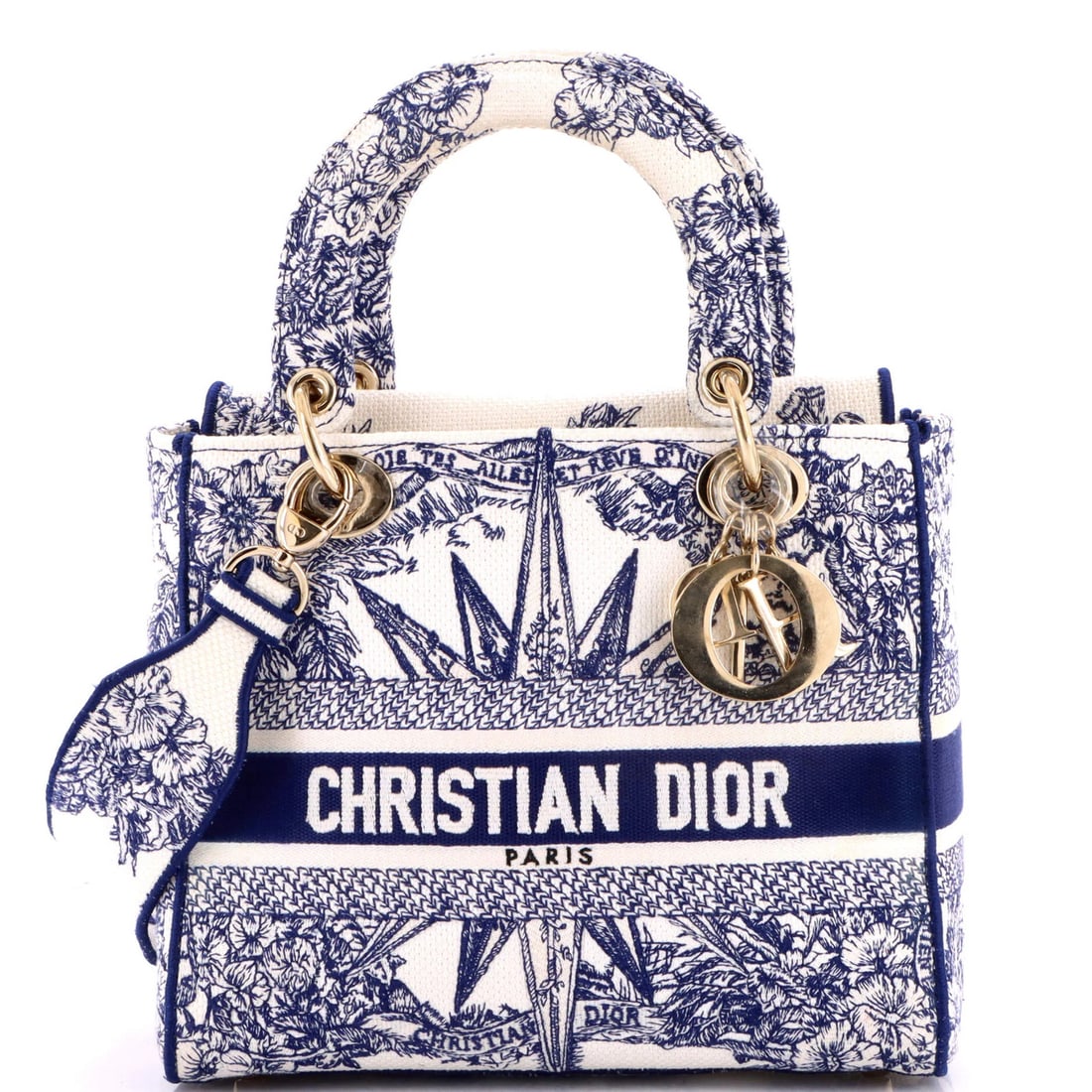 Lady D-Lite Bag Embroidered Canvas Christian Dior Medium: Lady D-Lite Bag Embroidered Canvas Christian Dior Medium The Lady D-Lite Bag Embroidered Canvas Christian Dior Medium boasts a stunning blue canvas exterior with a subtle embroidered design, complemen