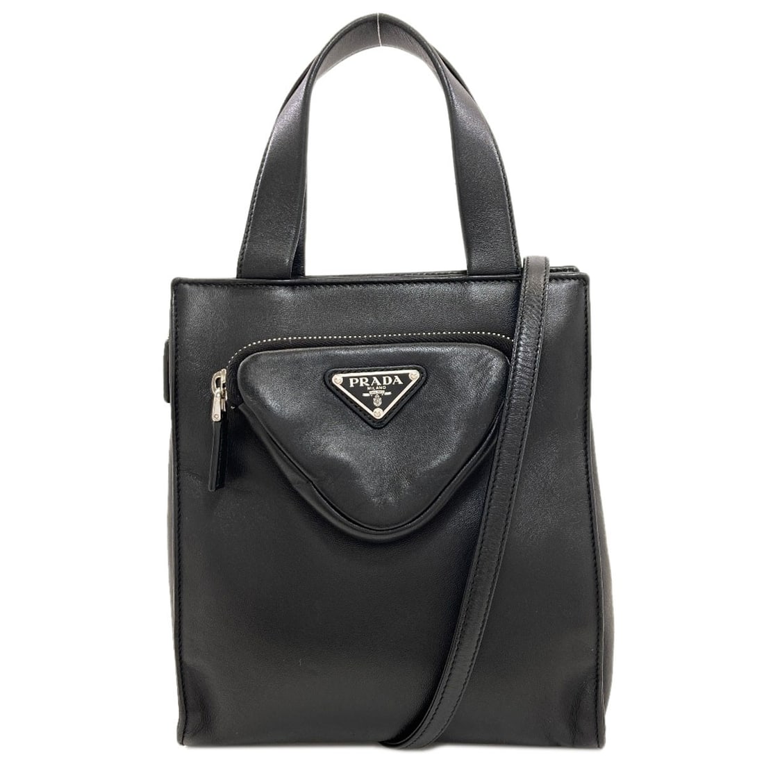 Lambskin Handbag Hardware Prada Logo: Lambskin Handbag Hardware Prada Logo Black lambskin exterior, a hallmark of luxury, adorns this PRADA handbag hardware. The iconic Prada logo is prominently displayed, adding a touch of