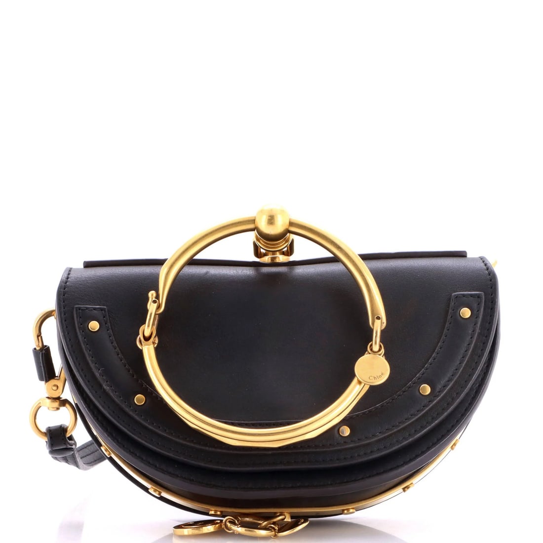 Chloe Nile Crossbody Bag Leather Mini: Chloe Nile Crossbody Bag Leather Mini The Chloe Nile Crossbody Bag Leather Mini is a stylish and compact accessory, featuring a black leather exterior with gold hardware. Measuring 4.5" tall and 7.5" 