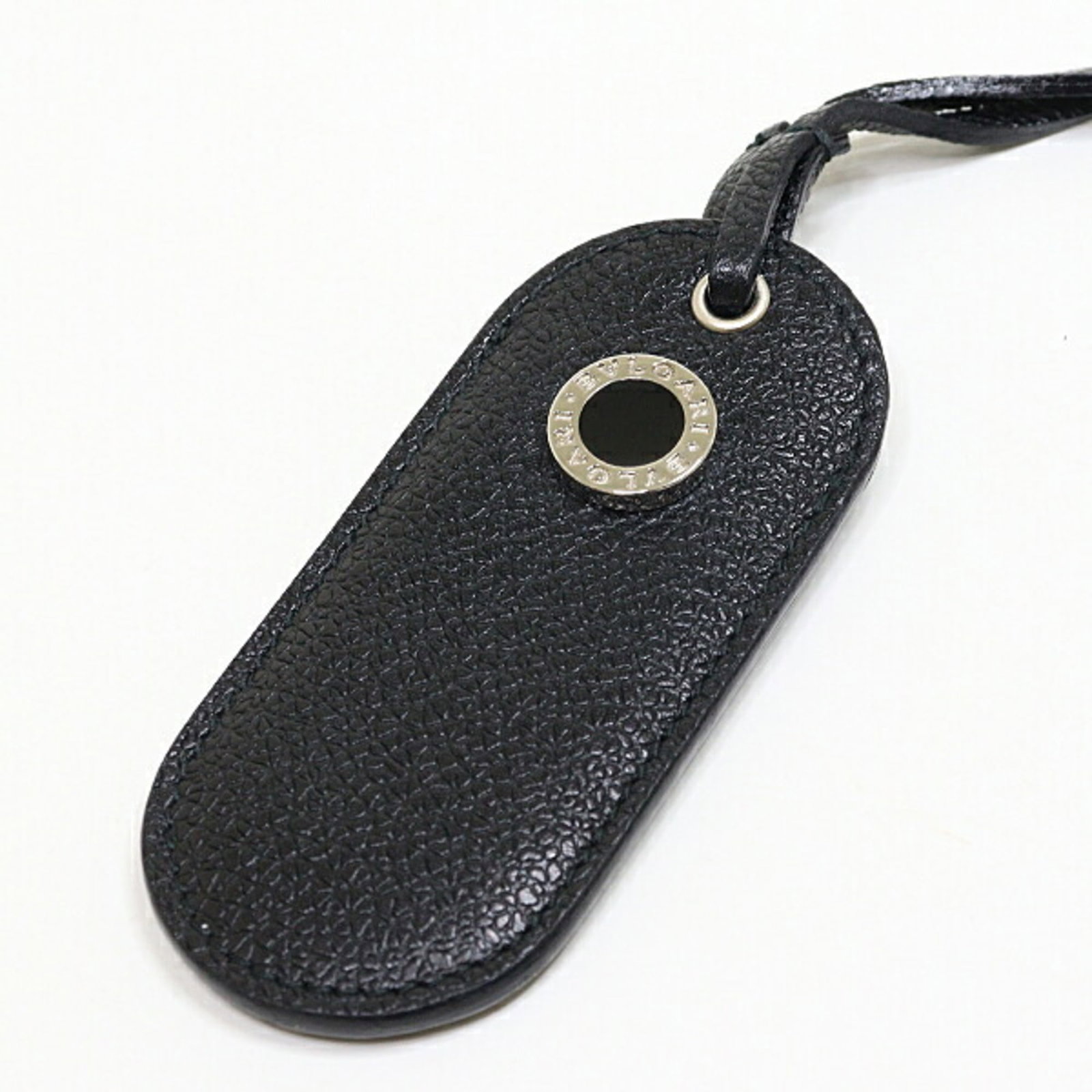 Key Chain Leather Bvlgari: Key Chain Leather Bvlgari Bvlgari's iconic leather key chain is a sleek accessory for everyday carry, featuring a classic black design that exudes timeless elegance. Made from high-quality leather, th