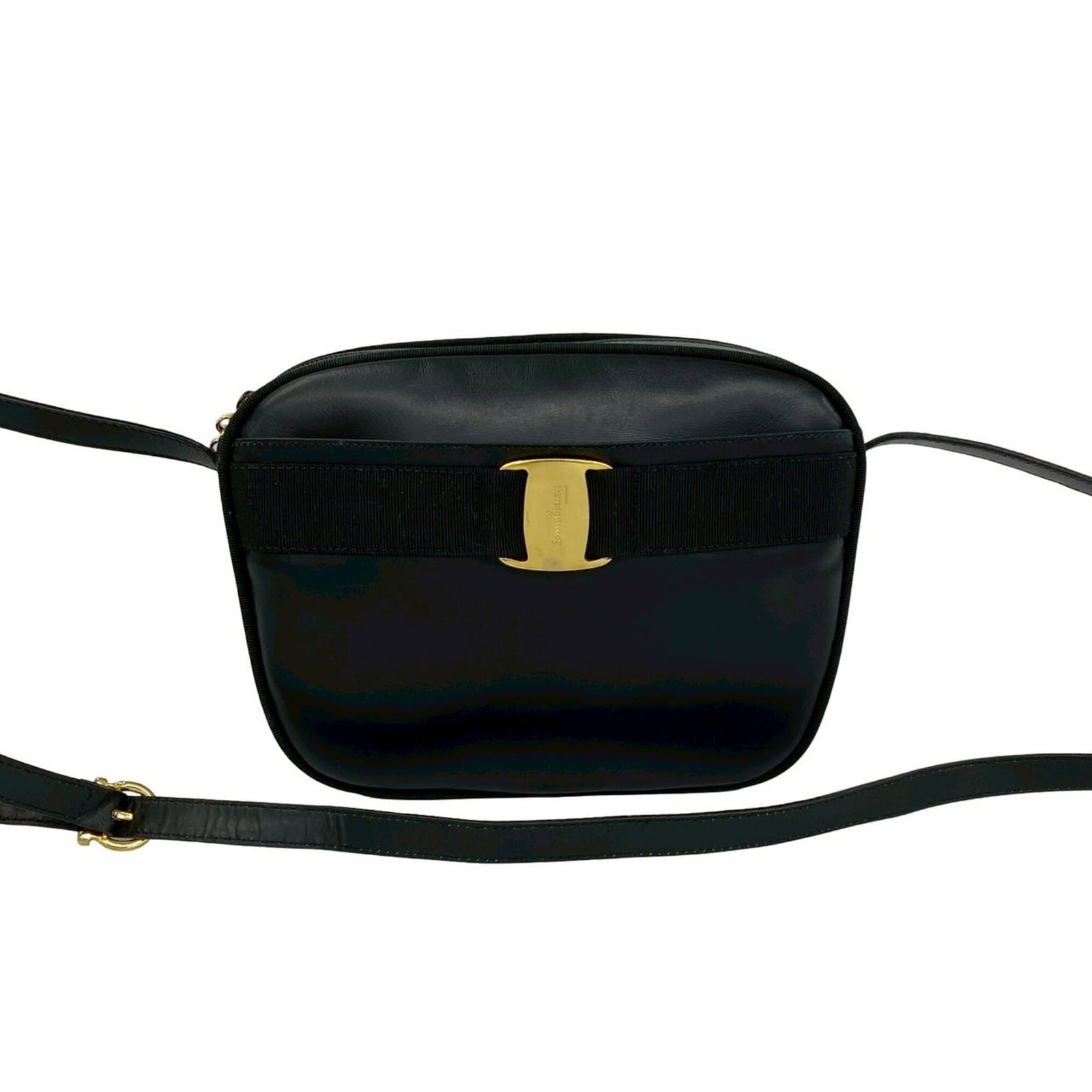 Ferragamo Leather Shoulder Bag: Ferragamo Leather Shoulder Bag Black leather shoulder bag with clean lines and classic design. Made from high-quality leather, this bag measures 17.5cm x 24cm x 7.5cm. Its sleek silhouette makes it a