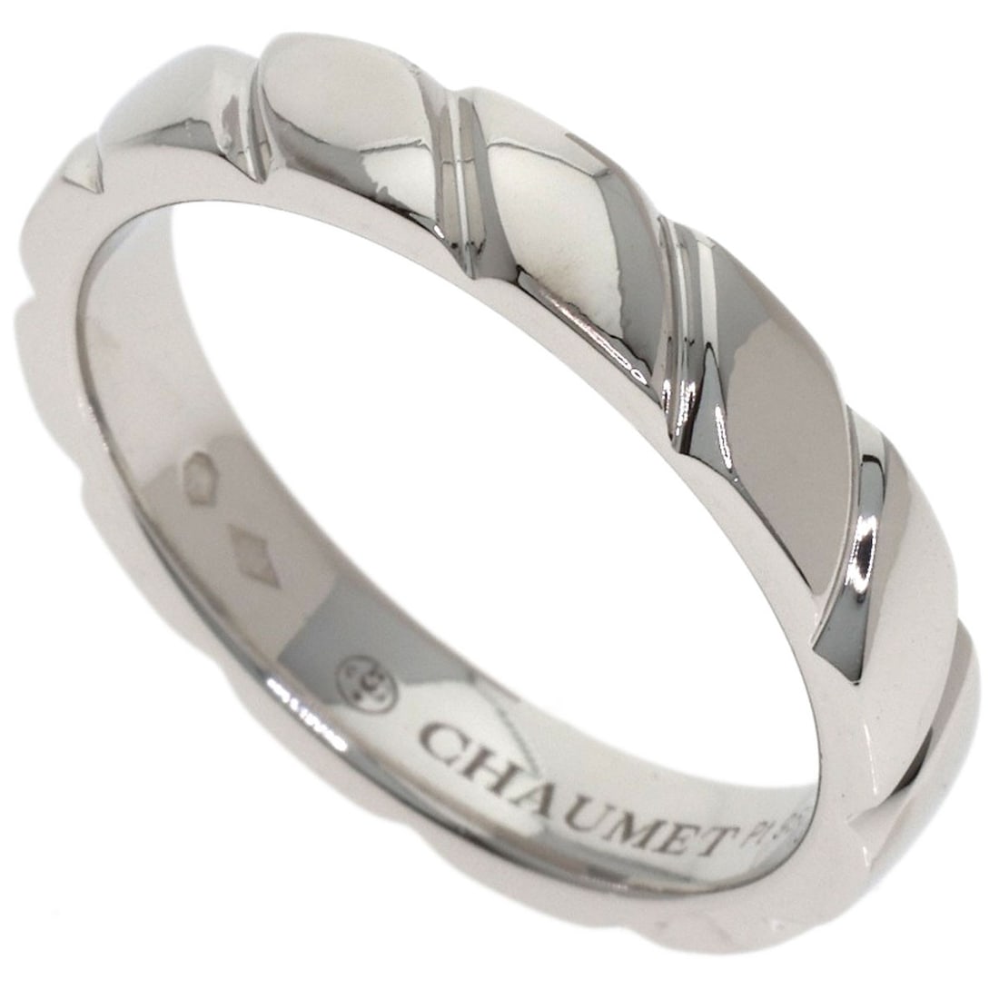 Chaumet Torsade Ring Platinum Pt950: Chaumet Torsade Ring Platinum Pt950 Chaumet's Torsade Ring is a striking example of platinum craftsmanship, featuring a sleek silver exterior and a signature that bears witness to the brand's expertis