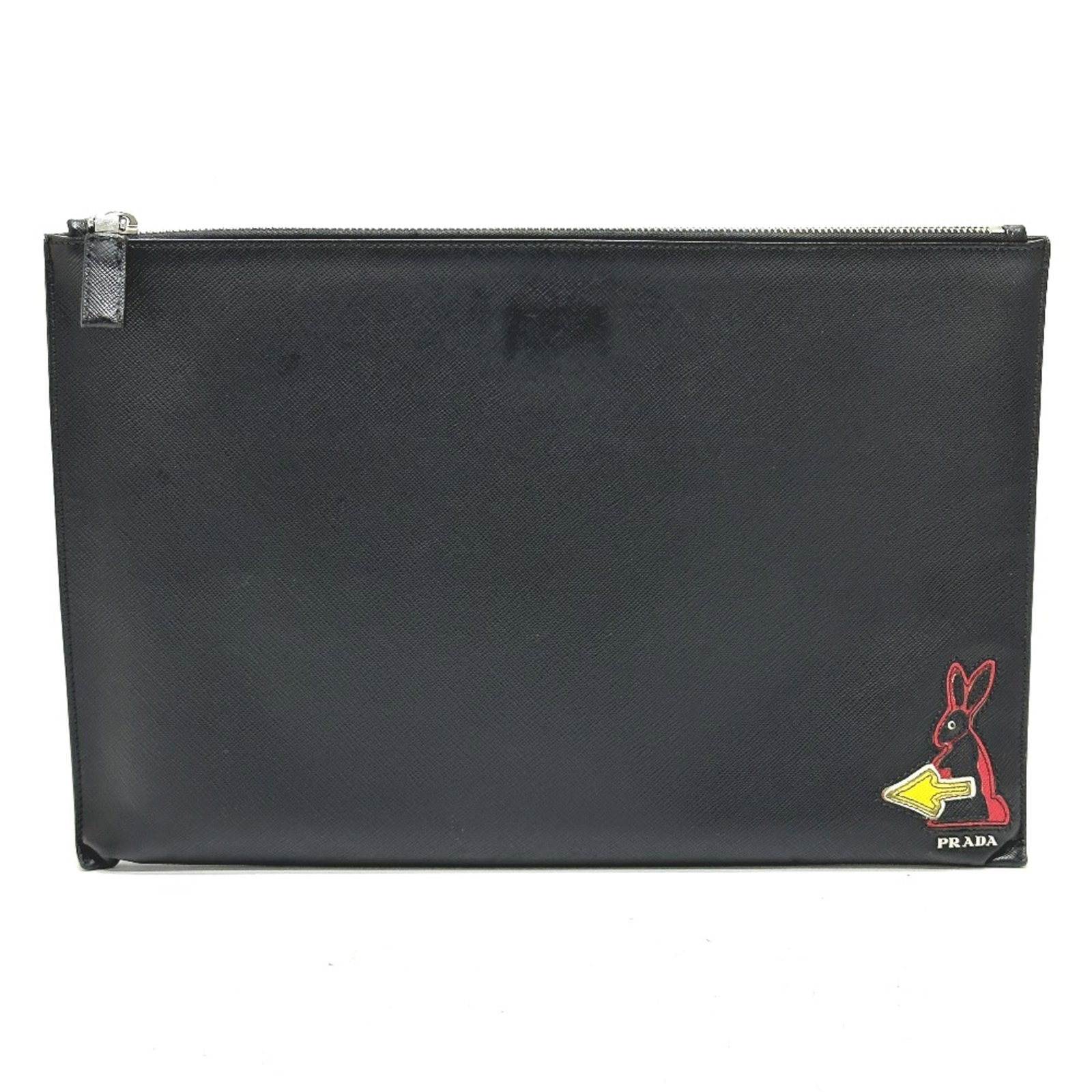 Clutch Bag Leather Prada: Clutch Bag Leather Prada Black leather Prada clutch bag with a compact size of 35.5cm x 23.5cm and 14.0cm x 9.3cm. Made from high-quality leather, this stylish clutch features a sleek design and a cla