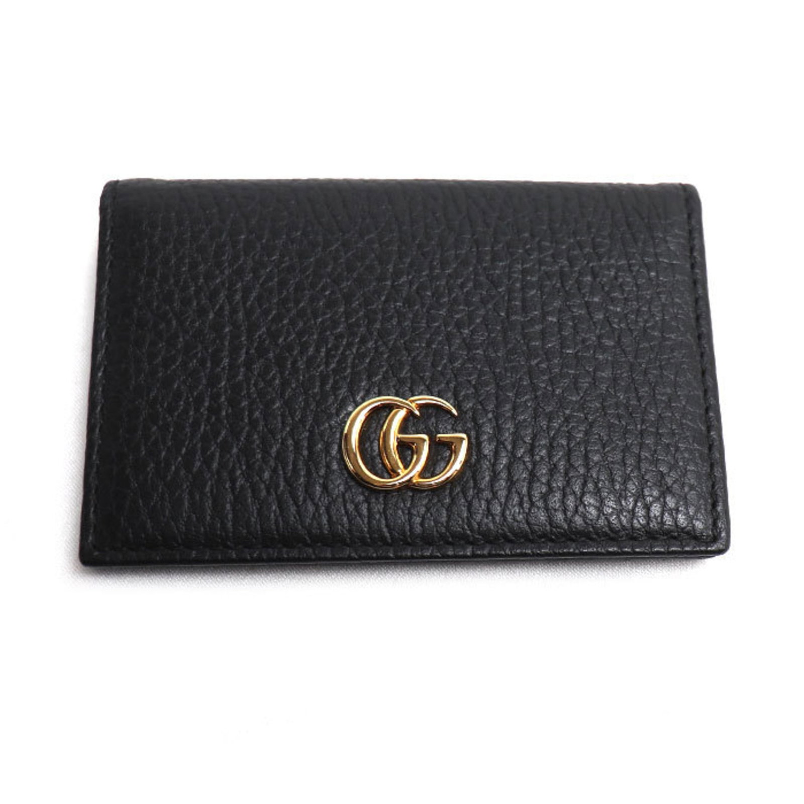 Case Card Leather Gucci: Case Card Leather Gucci This sleek case card is crafted from high-quality leather, characteristic of Gucci's signature style. Measuring 7cm x 10.5cm, it features a classic design that complements any 