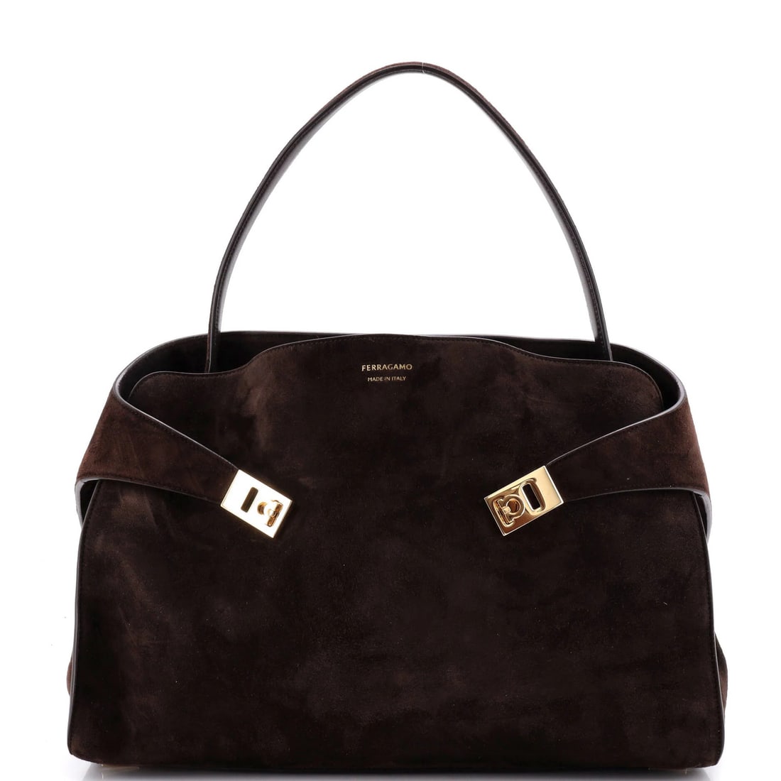 Suede Hug Shoulder Bag Salvatore Ferragamo Large: Suede Hug Shoulder Bag Salvatore Ferragamo Large Suede Hug Shoulder Bag Salvatore Ferragamo Large is a beautifully crafted satchel with a rich, brown suede exterior and a luxurious leather interior. T