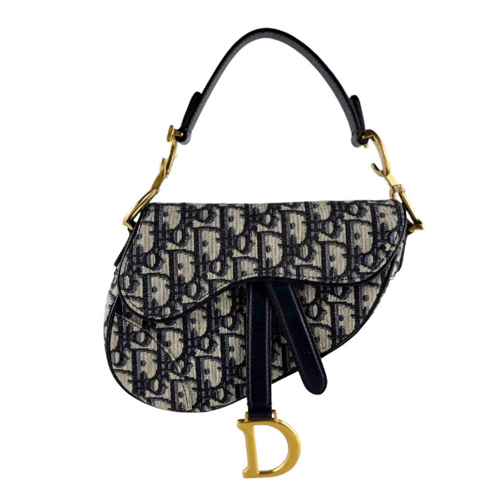 Christian Dior Leather Canvas Saddle Bag: Christian Dior Leather Canvas Saddle Bag Navy canvas and leather saddle bag from Christian Dior, measuring 15cm x 18cm x 3cm. This Italian-made bag features a classic design with a canvas and leather