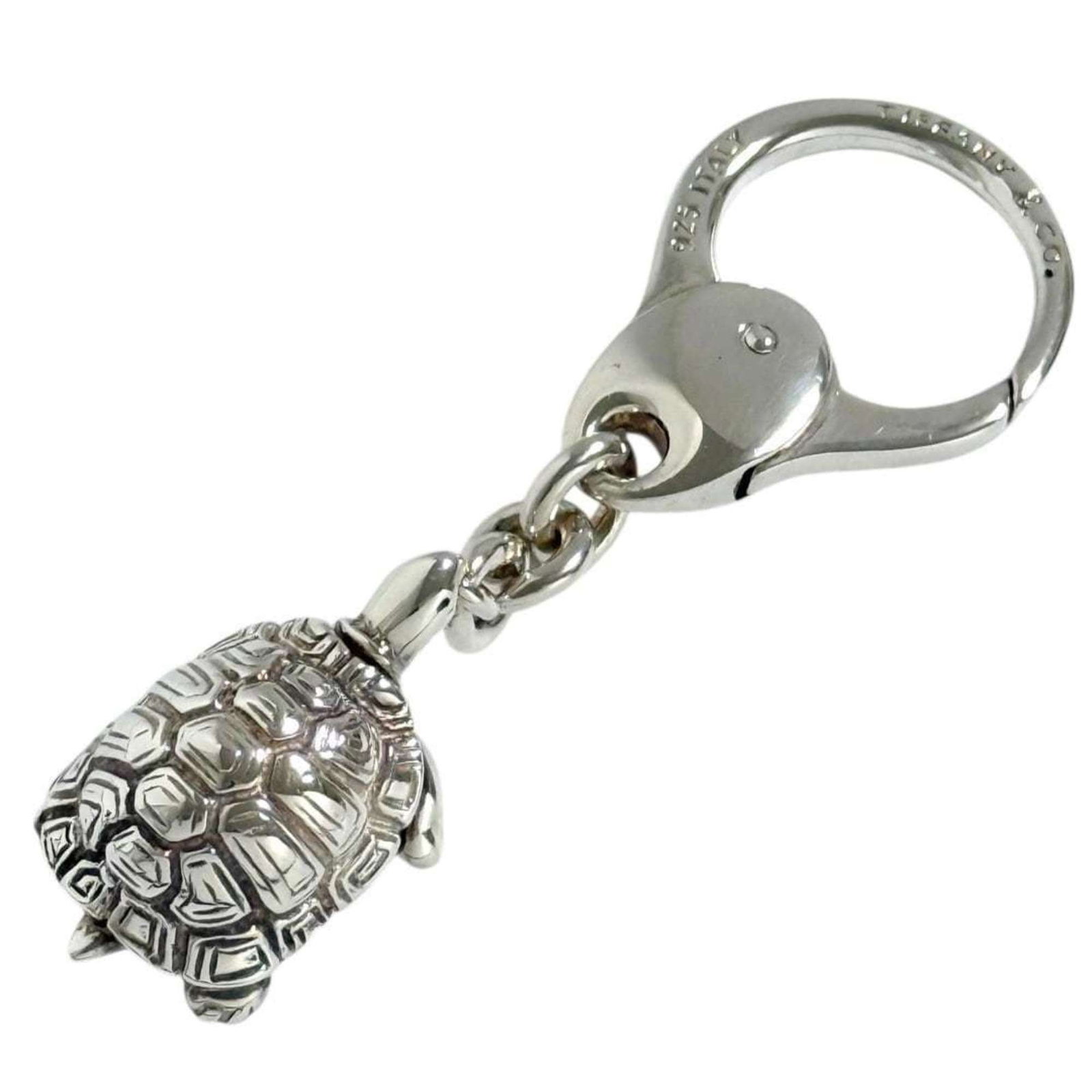 Tiffany Keyring Silver 925: Tiffany Keyring Silver 925 Silver 925 keyring from Tiffany, crafted in Italy, bears a hallmark of quality and attention to detail. Made from sterling silver, this elegant accessory is a subtle yet