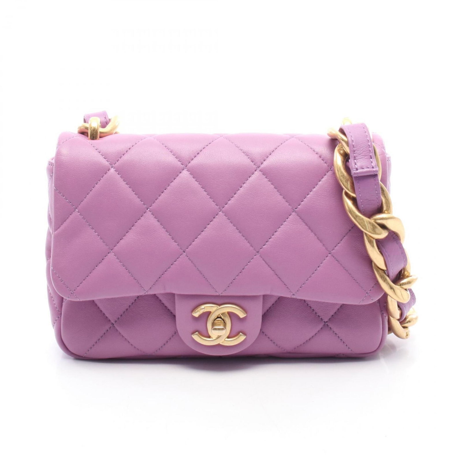 Shoulder Bag Leather Handbag Chanel: Shoulder Bag Leather Handbag Chanel This luxurious Chanel shoulder bag is crafted from rich, supple lambskin leather in a stunning purple hue. Measuring 15cm x 21cm x 4.5cm, it features a sleek