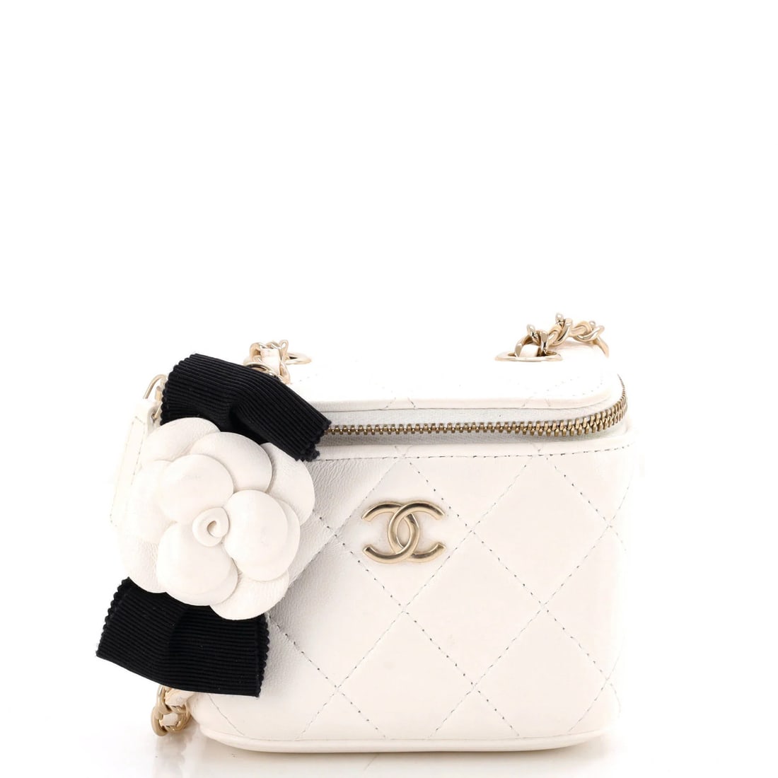 Camellia Bow Vanity Case with Chain Quilted Lambskin Mini Chanel: Camellia Bow Vanity Case with Chain Quilted Lambskin Mini Chanel The Camellia Bow Vanity Case with Chain Quilted Lambskin Mini Chanel is a beautifully crafted, white leather cross body bag with a