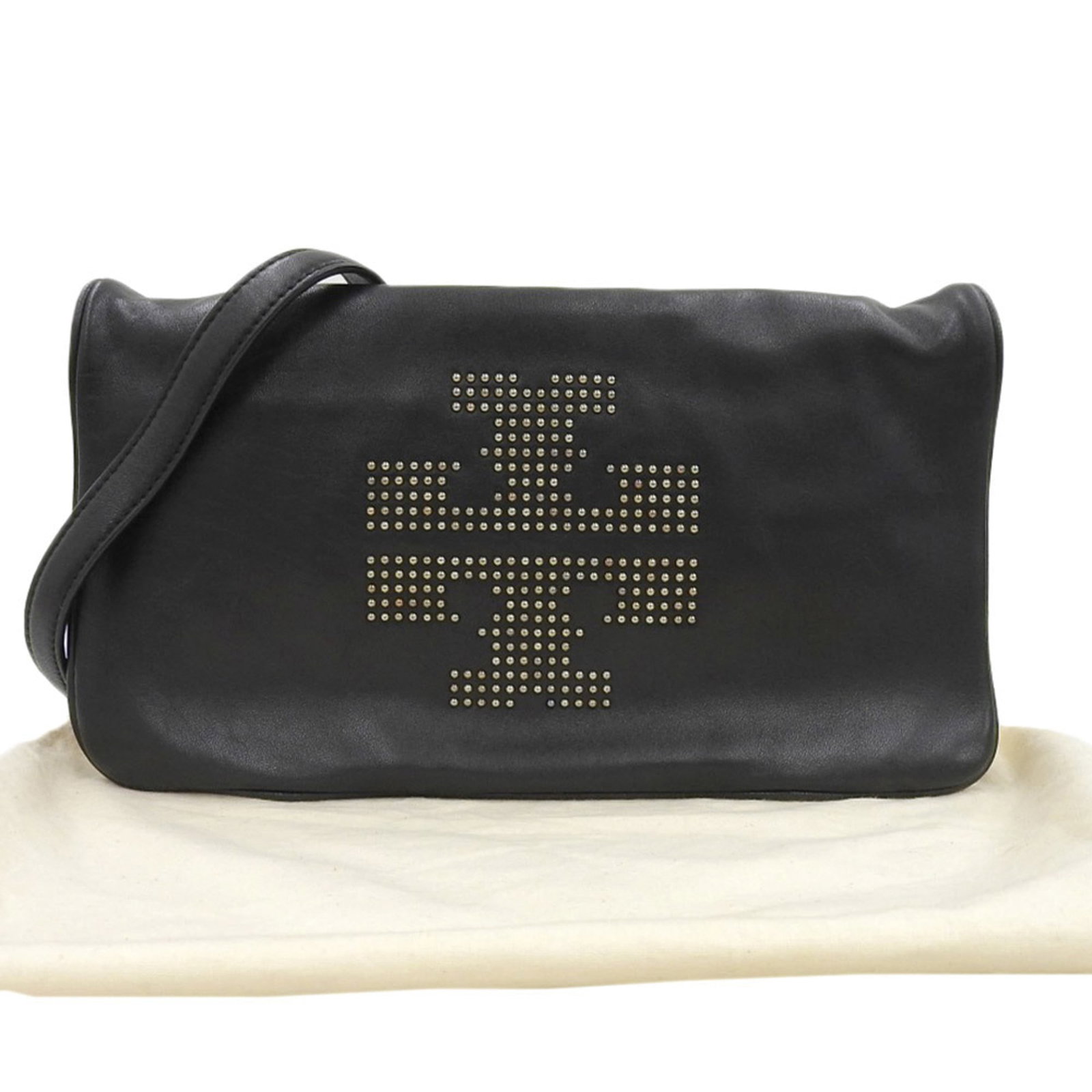 Shoulder Bag Leather Tory Burch Clutch: Shoulder Bag Leather Tory Burch Clutch Black leather shoulder bag with a clutch design, featuring a 17cm x 36cm x 4cm size and a dust bag and shoulder strap included. The bag's sleek design and