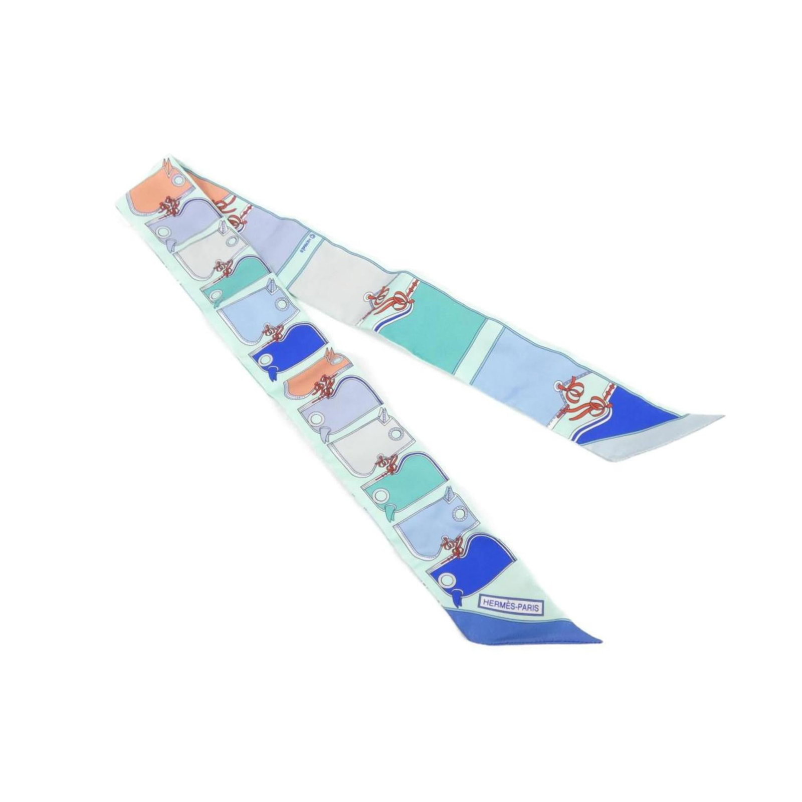 Silk Hermes Scarf: Silk Hermes Scarf Silk from Hermes, this Twilly scarf features a blue color and measures 5cm x 86cm. Made from high-quality silk, it comes in a box. A beautiful accessory for any collection. Item Spec