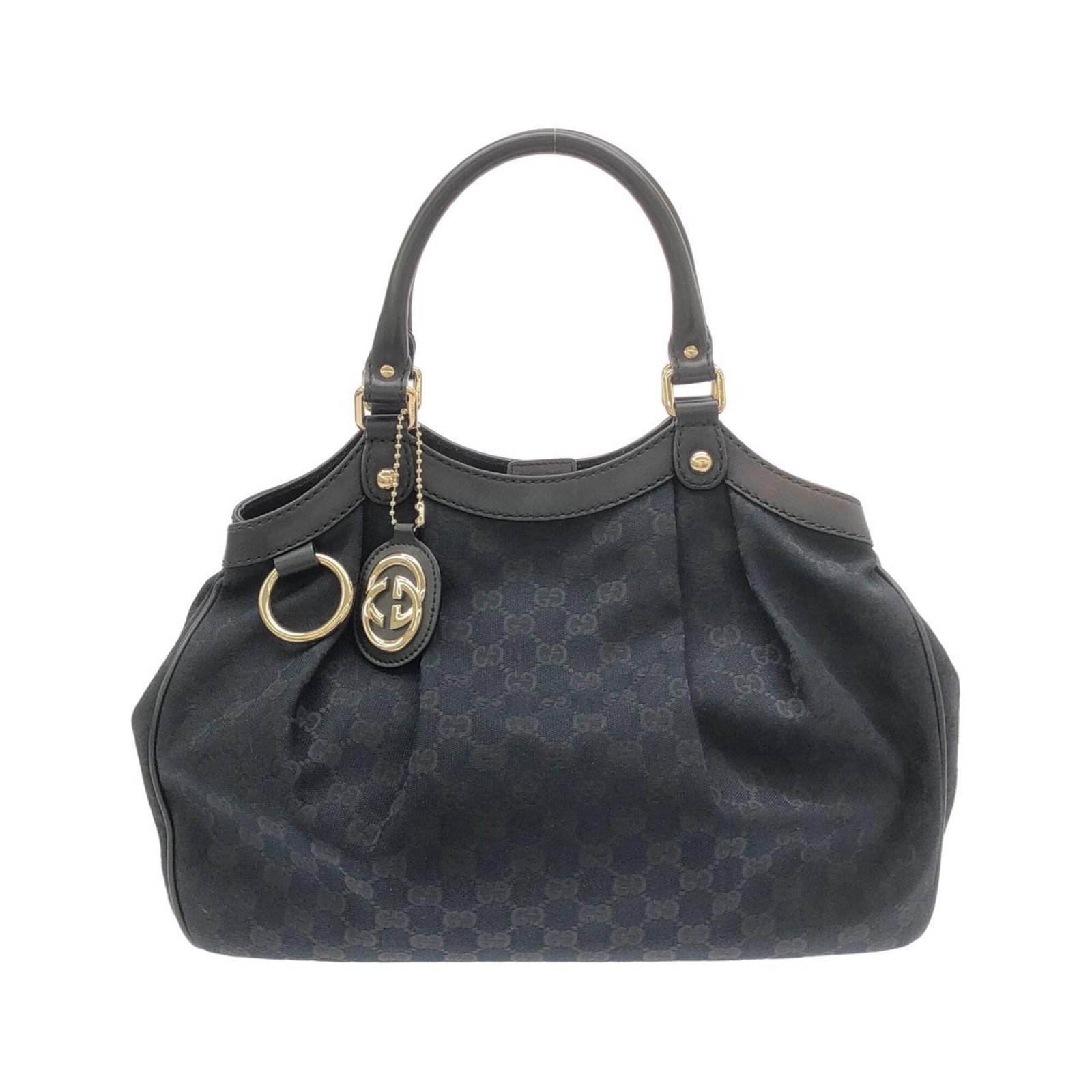 Gucci Canvas Handbag: Gucci Canvas Handbag Gucci Canvas Handbag in Black - A stylish and versatile accessory, this handbag features the iconic GG canvas material and a sleek black color. With its compact size and durable d