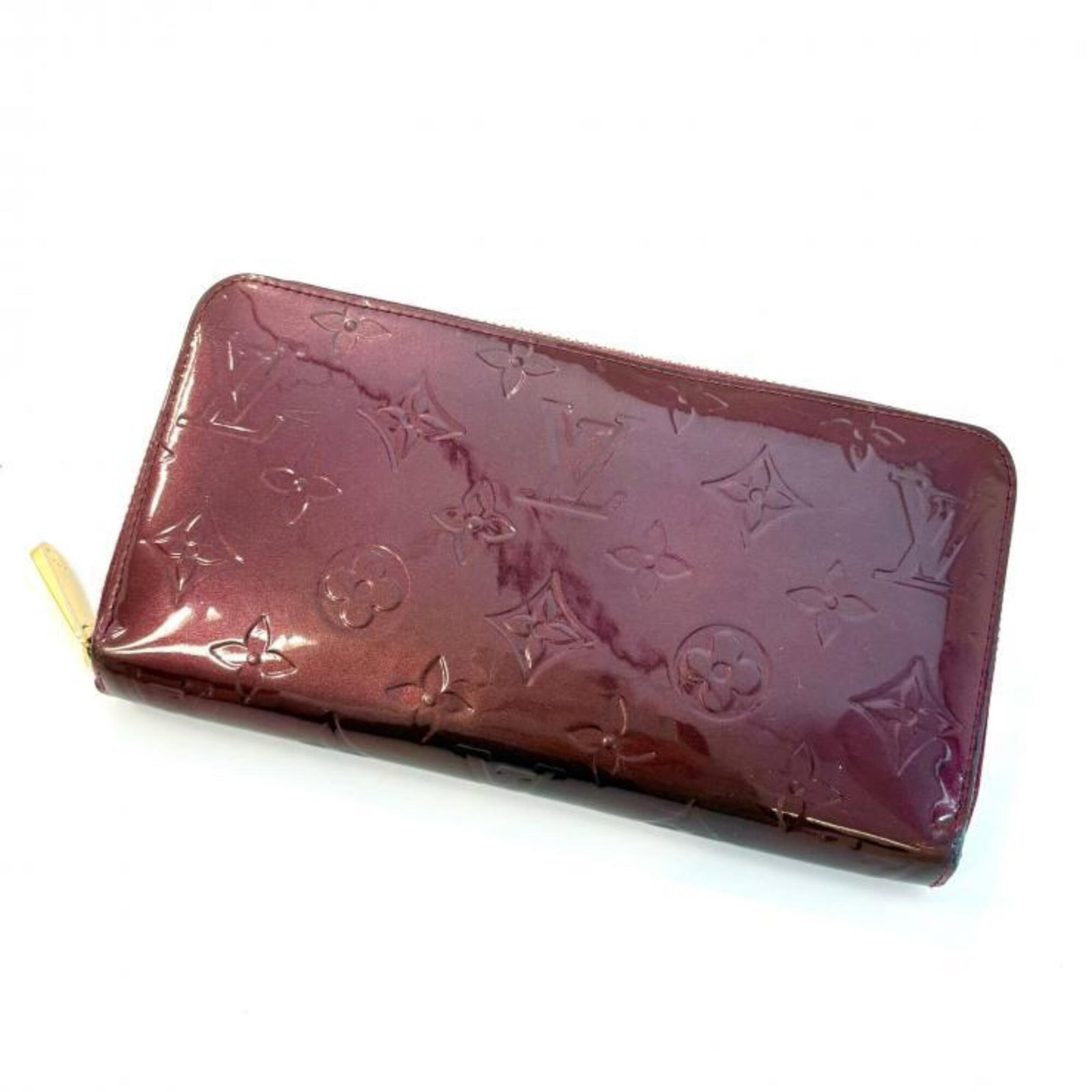 Louis Vuitton Long Wallet (Bi-Fold) Monogram Vernis: Louis Vuitton Long Wallet (Bi-Fold) Monogram Vernis The Louis Vuitton Long Wallet (Bi-Fold) Monogram Vernis boasts a striking design with its signature Rouge fauviste color and iconic Monogram Vernis
