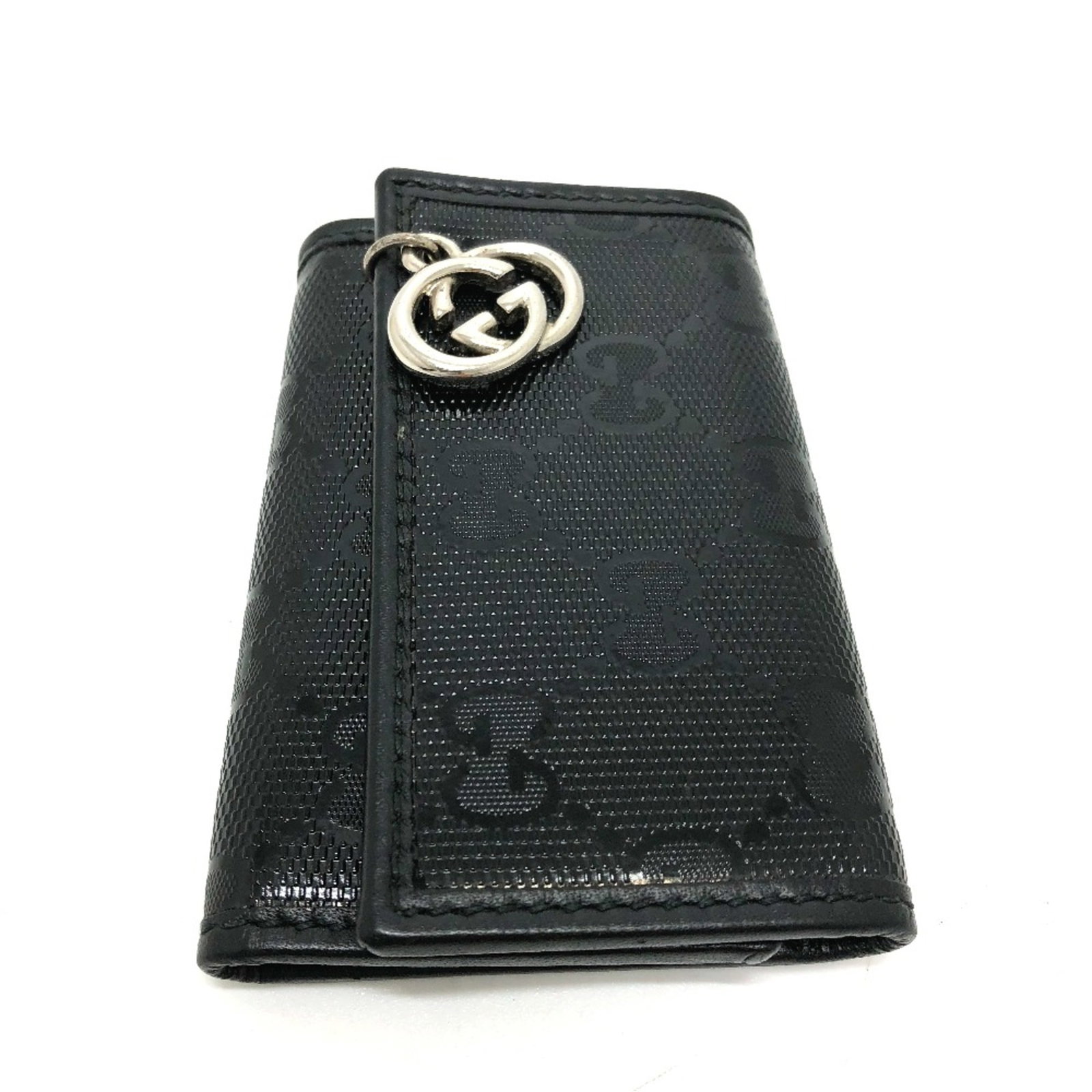 Keycase Gucci Other: Keycase Gucci Other Keycase by Gucci, a sleek and compact accessory featuring a black finish. Measuring 6.5cm x 9.5cm x 1cm, this keycase is designed to be a stylish and functional addition to any man