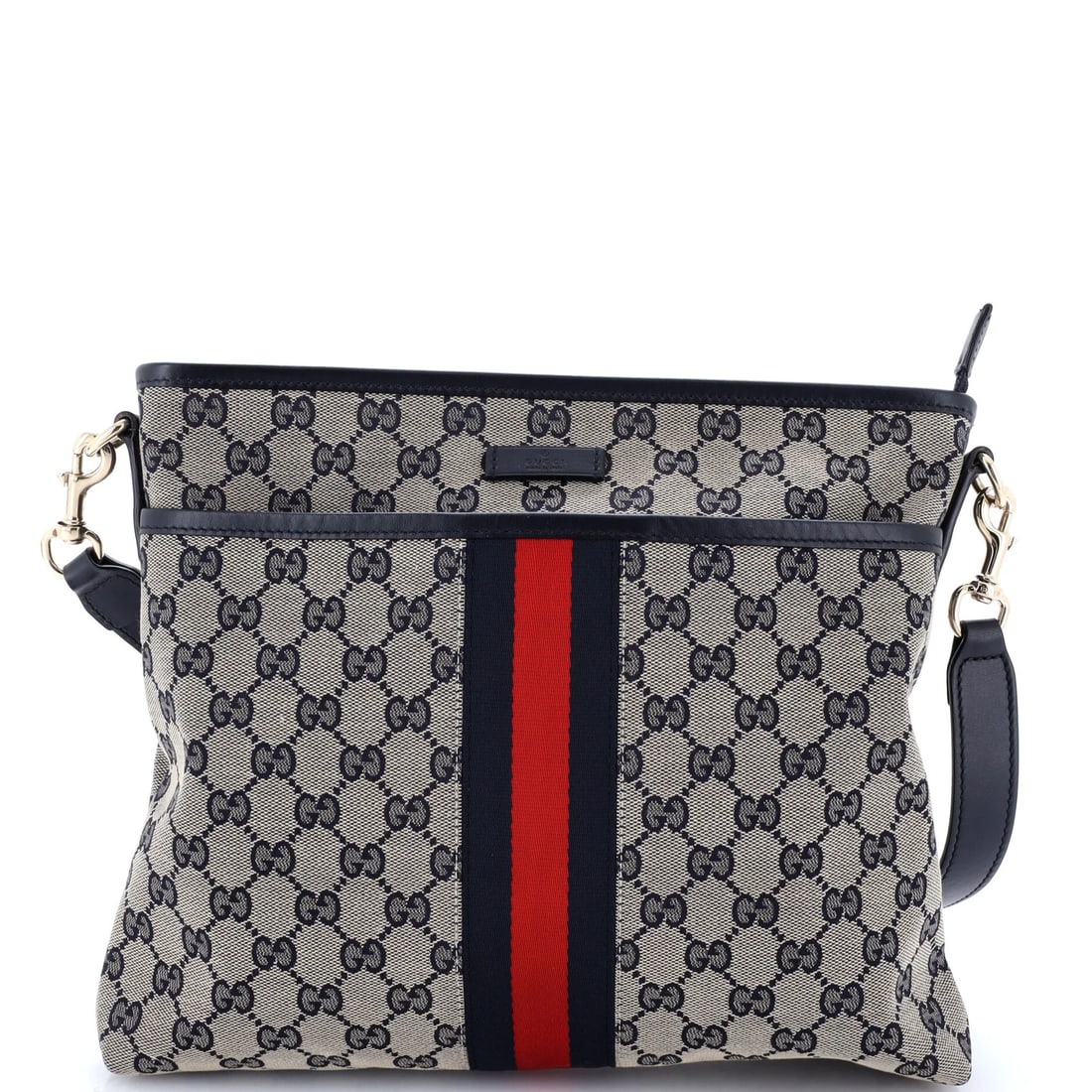 Front Gucci Pocket Web Small Messenger GG Canvas: Front Gucci Pocket Web Small Messenger GG Canvas The Gucci Front Pocket Web Small Messenger GG Canvas is a stylish and functional cross-body bag. With its blue canvas exterior and gold tone hardware,