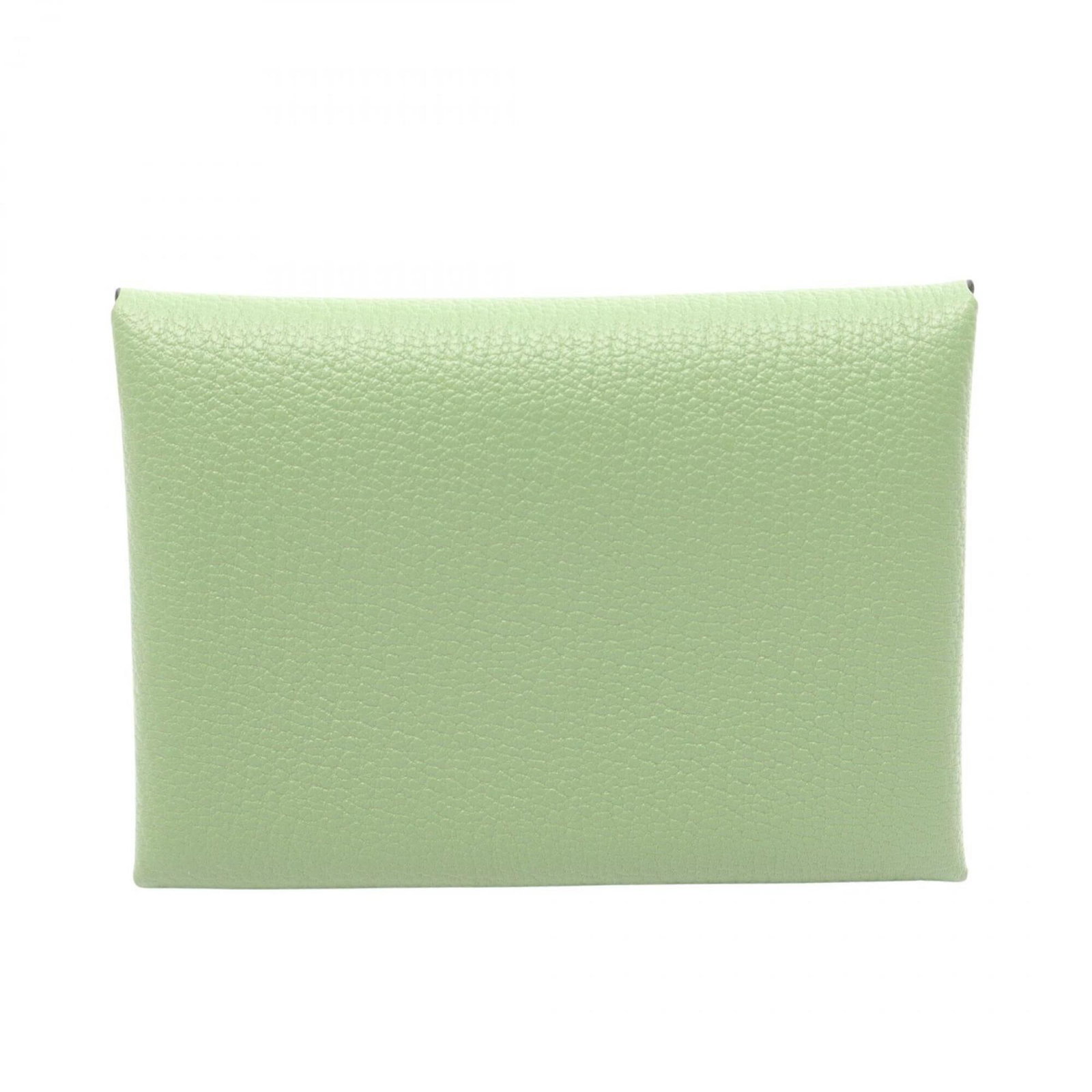 Hermes Coin Case Leather Purse Chevre: Hermes Coin Case Leather Purse Chevre Chevre leather provides a unique texture to this 7cm x 10cm x 2cm coin purse, while the green color adds a touch of elegance. The purse's compact size makes it a