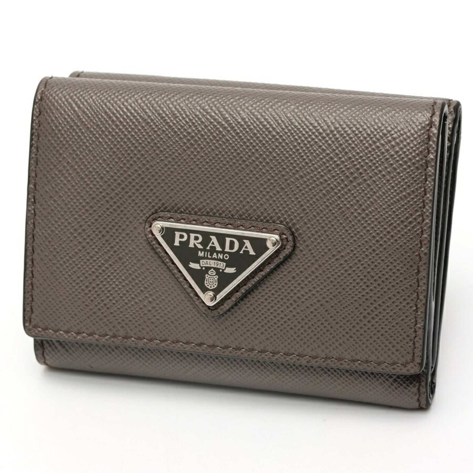 Prada Wallet (Tri-Fold) Leather: Prada Wallet (Tri-Fold) Leather Tri-fold leather wallet from Prada, crafted in Italy, features a classic design with clean lines and premium leather construction. Measuring 7.5cm x 9.5cm, this wallet