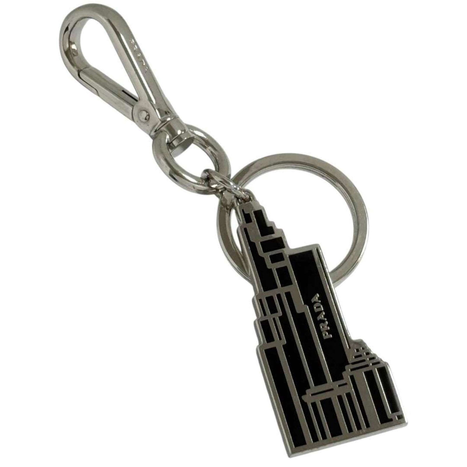 Keyring Metal Prada: Keyring Metal Prada Black metal keyring from Prada. Made of metal, this keyring is a simple yet elegant accessory. Item Specifics: Brand: Prada Type: Keyring Gender: Men Color: Black Material: Metal P