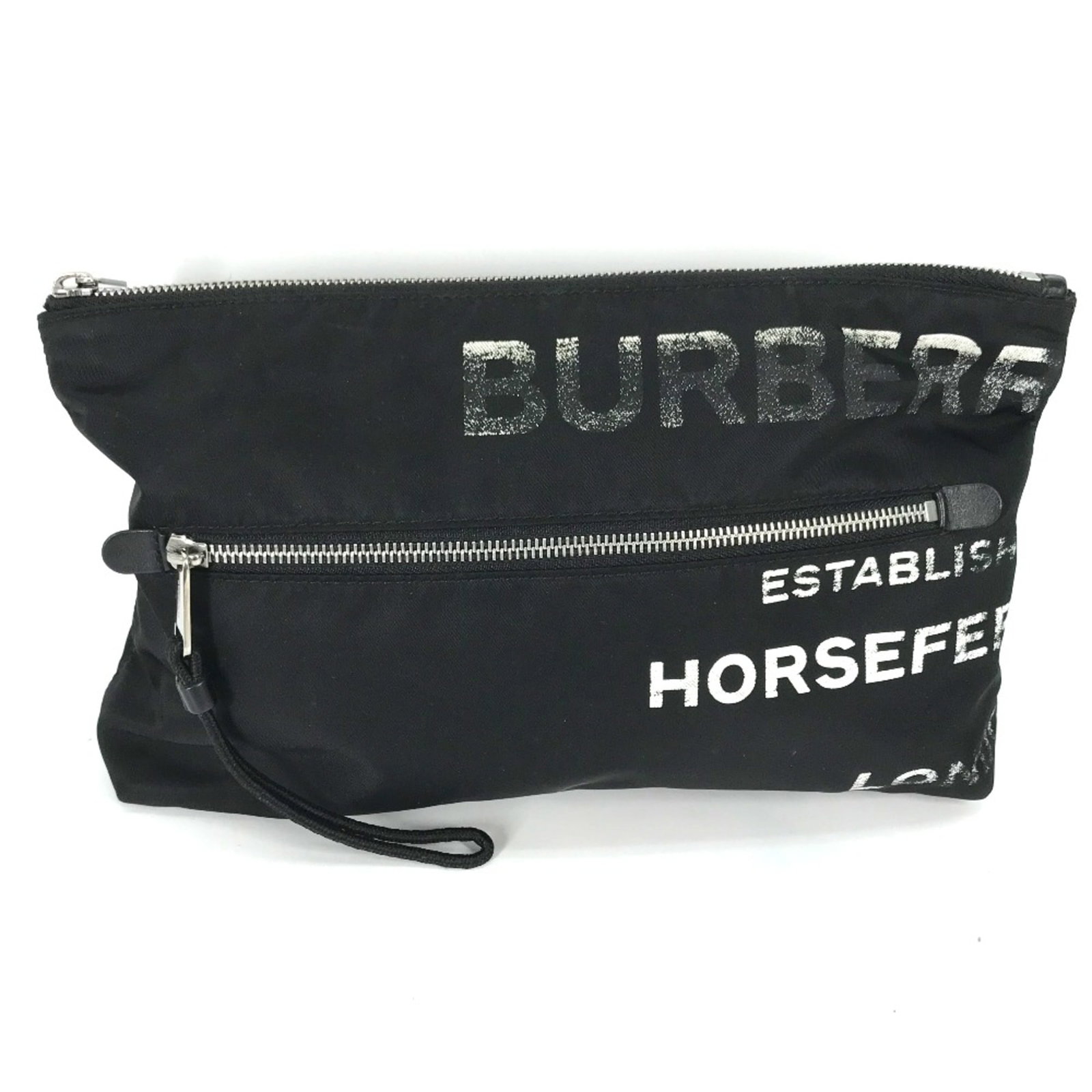 Cloth clutch bag by Burberry: Cloth clutch bag by Burberry Black cloth clutch bag by Burberry, measuring 31.5cm wide and 19cm tall, with a compact 5.5cm depth. This classic design features a simple, timeless aesthetic. Made from