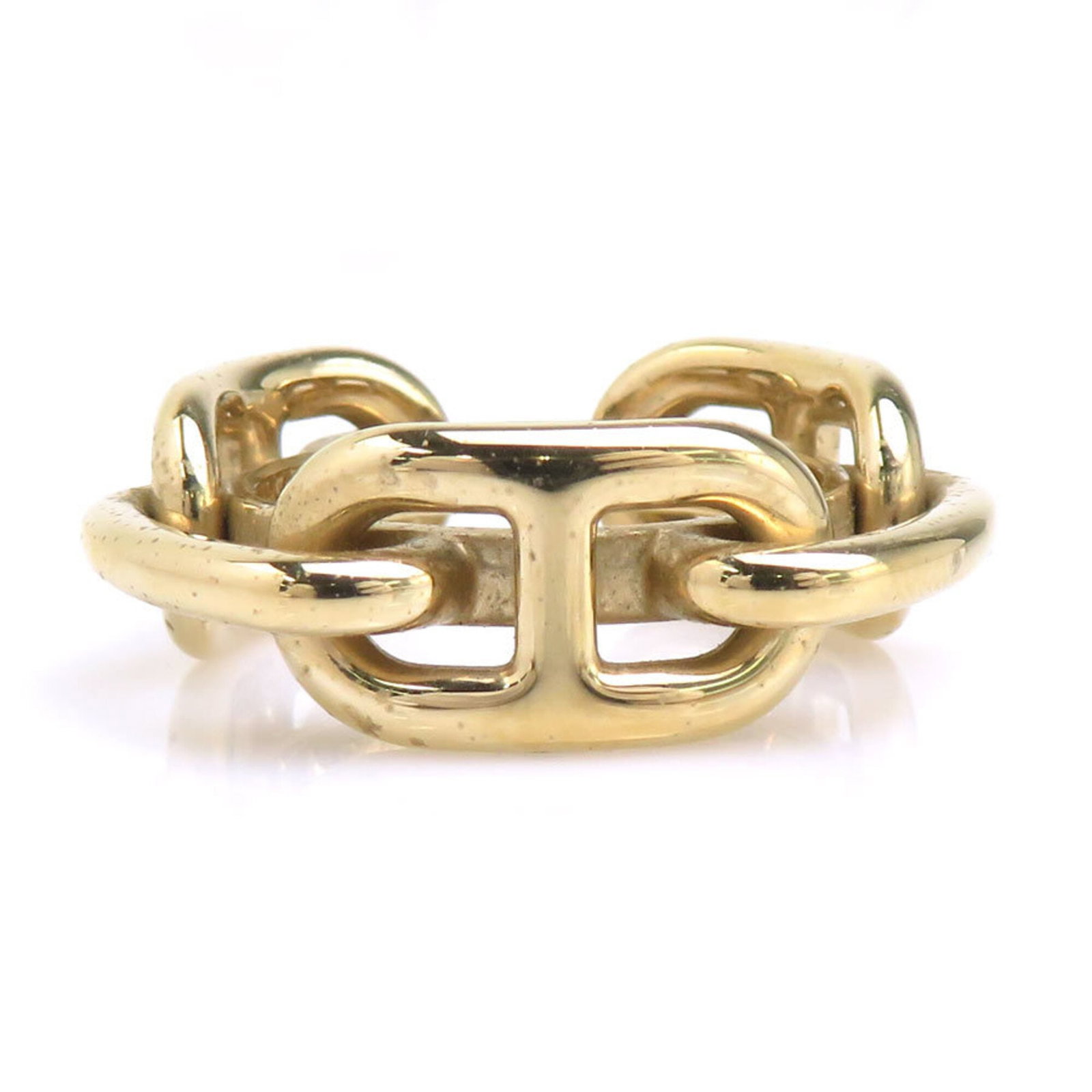 Ring Scarf Metal Hermes: Ring Scarf Metal Hermes Ring Scarf Metal Hermes is a gold metal accessory featuring a notable signature. This small, 3cm x 1cm metal piece boasts a sleek design and bears a signature. Item Specifics: