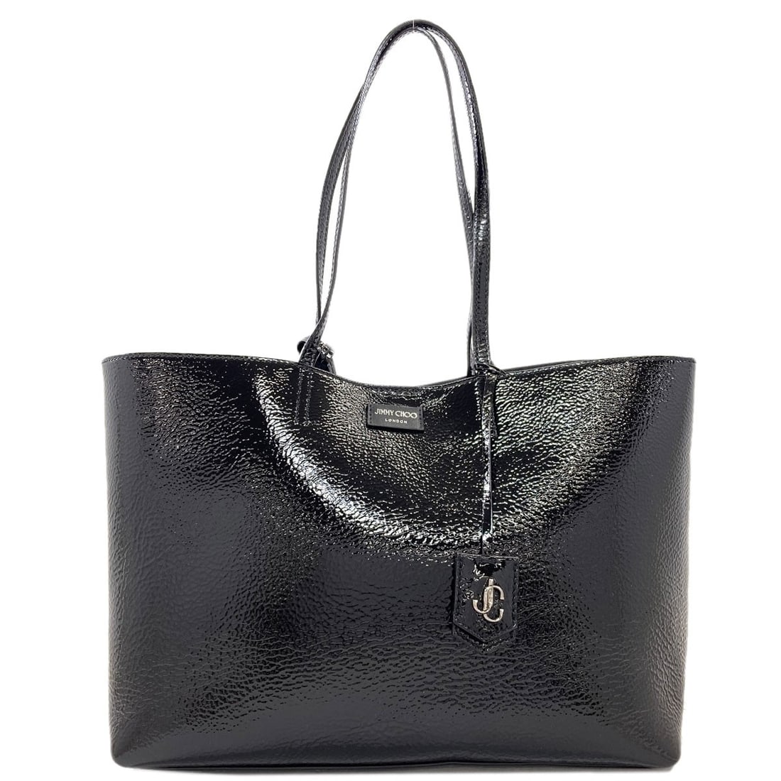 Jimmy Choo Logo Patent Leather Tote Bag: Jimmy Choo Logo Patent Leather Tote Bag Jimmy Choo Logo Patent Leather Tote Bag in black features patent leather exterior and the brand's logo. This tote bag is made from patent leather, a durable