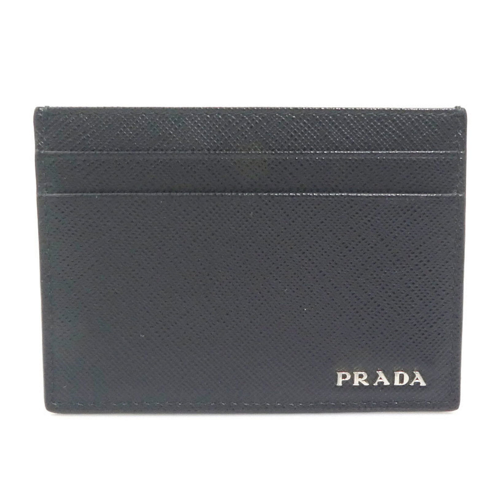 Case card Prada Leather: Case card Prada Leather This Prada Leather card case is a sleek and sophisticated accessory, featuring a classic black design that exudes understated elegance. Made from high-quality leather, its