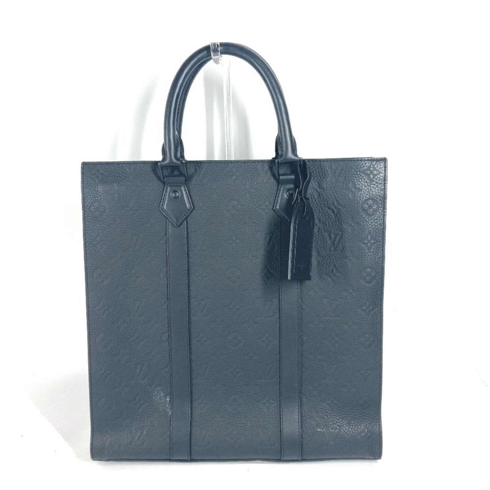 Louis Vuitton Handbag Tote Bag Leather: Louis Vuitton Handbag Tote Bag Leather Taurillon leather gives this Louis Vuitton M21866 tote bag its distinctive look and feel, while the black color provides a sleek and sophisticated appearance.