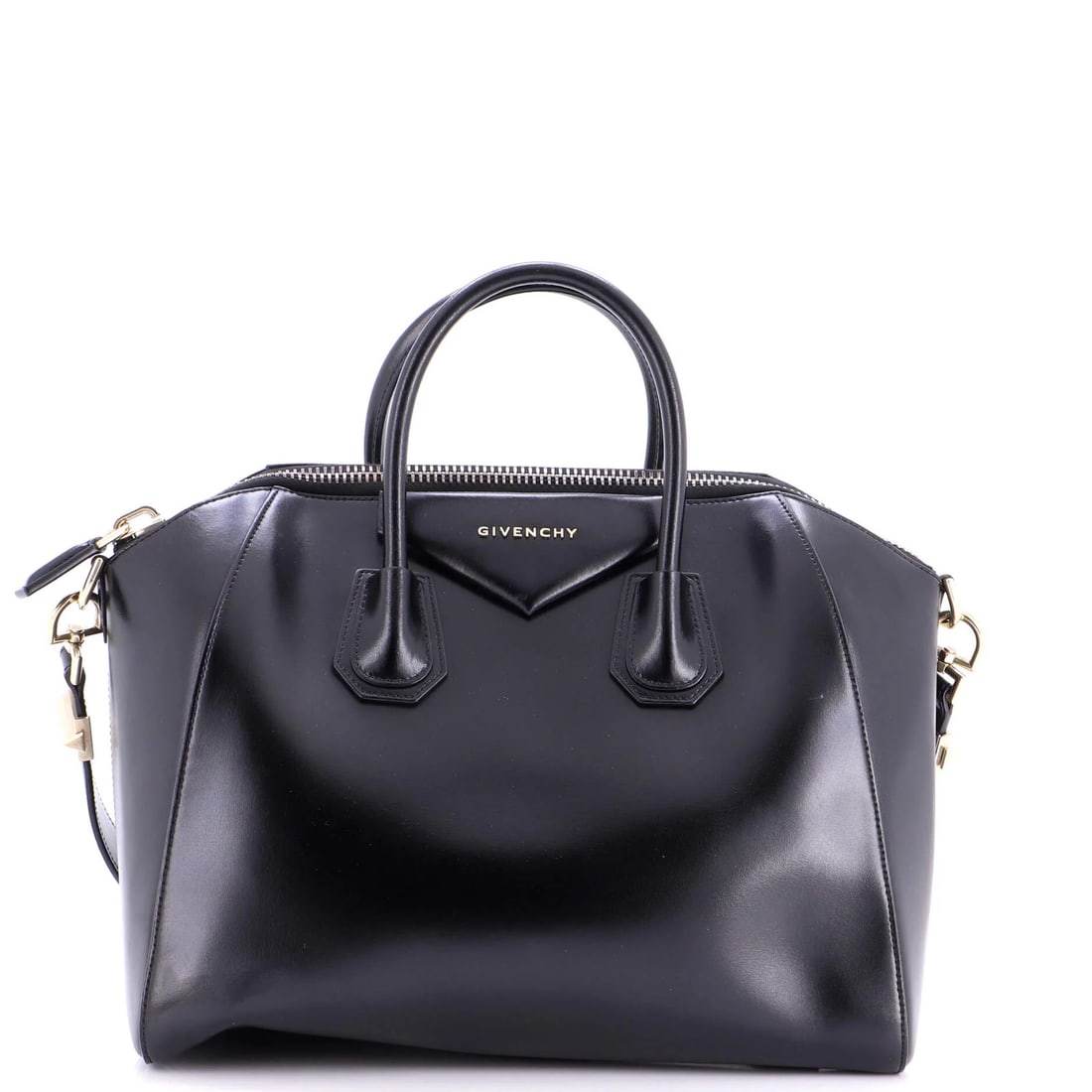 Glazed Leather Small Bag Antigona: Glazed Leather Small Bag Antigona The Glazed Leather Small Bag Antigona features a striking black exterior with a glossy finish, adorned with gold tone hardware and silver accents. This small satchel