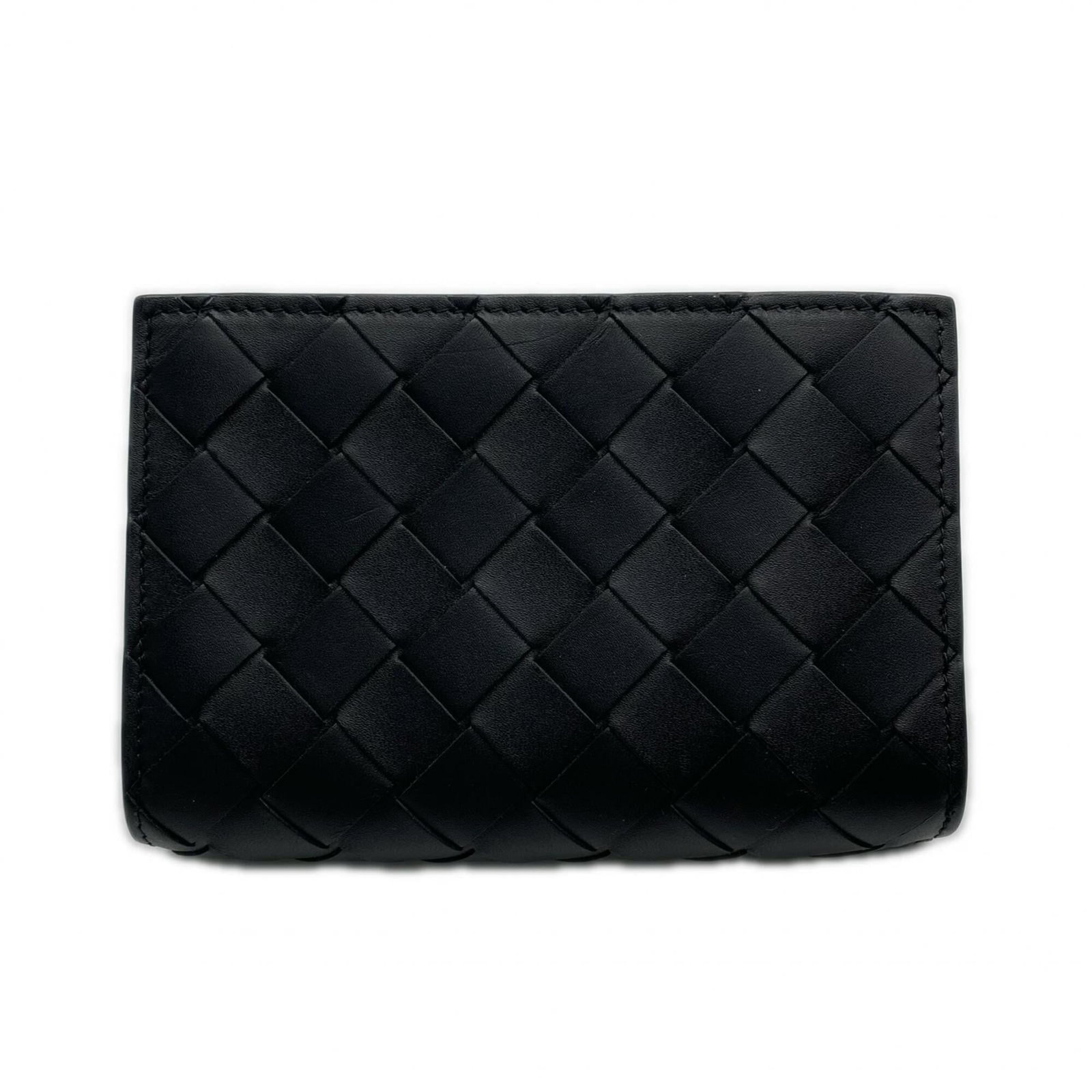 Bottega Veneta Wallet (Bi-Fold) Leather: Bottega Veneta Wallet (Bi-Fold) Leather Bottega Veneta's iconic bi-fold wallet is crafted from rich, supple calfskin leather, featuring the signature Intrecciato woven pattern. The sleek, modern