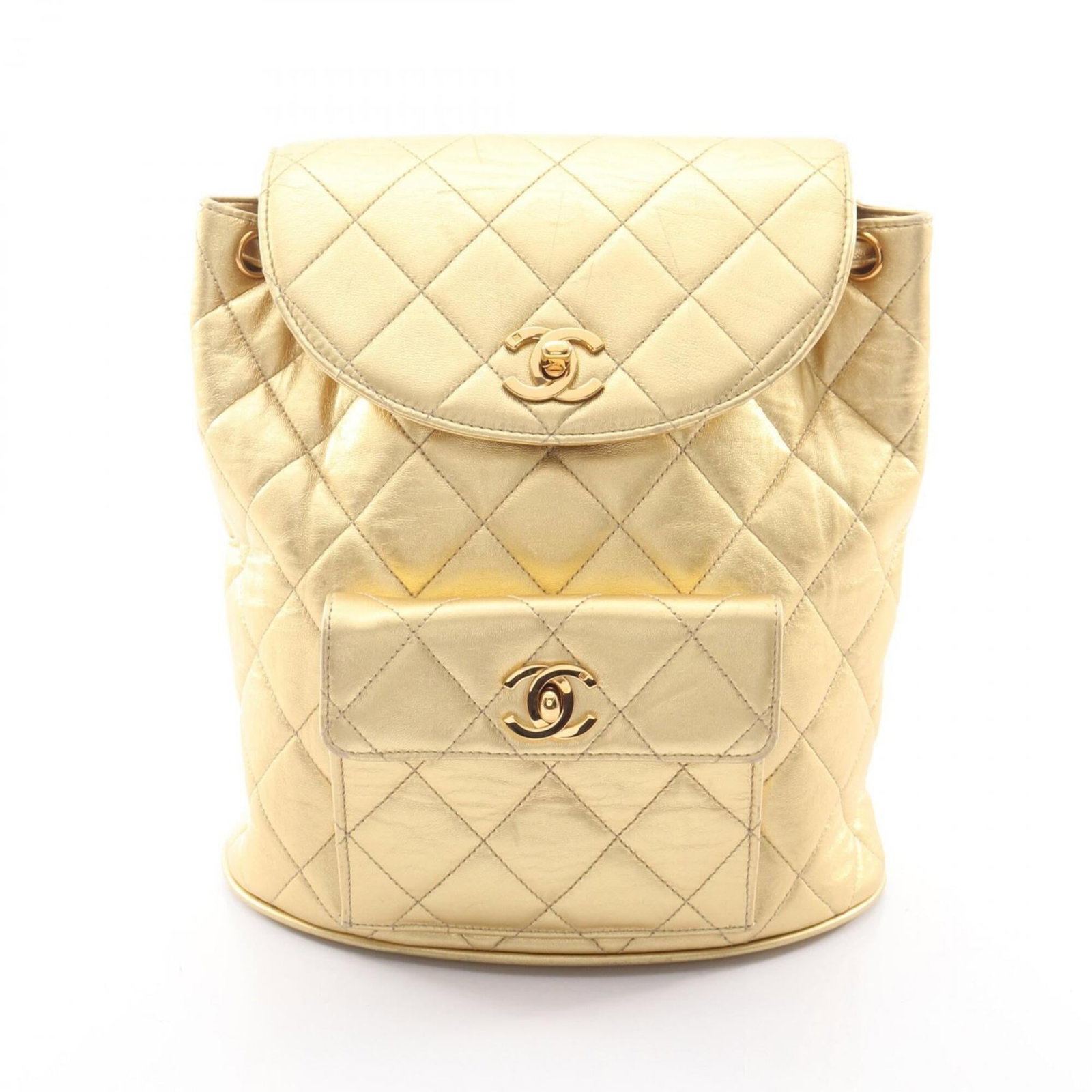 Backpack Leather By Chanel: Backpack Leather By Chanel Gold Leather Backpack by Chanel, 25cm x 22cm x 10cm, a stylish and compact accessory for everyday use. Made from high-quality leather, this classic backpack features a timel