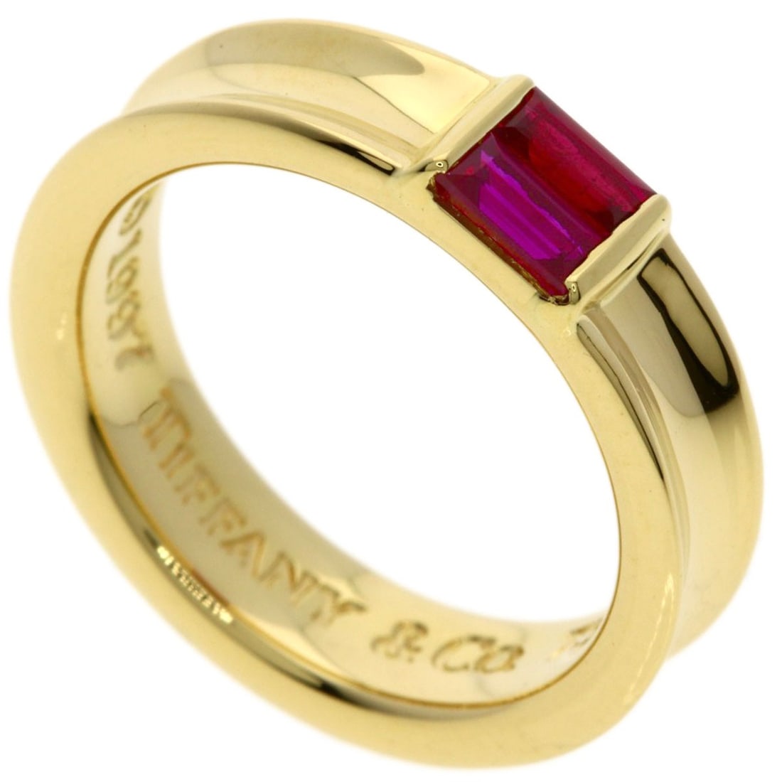 Yellow Gold Tiffany&Co Stacking Ruby K18 Ring: Yellow Gold Tiffany&Co Stacking Ruby K18 Ring Yellow Gold Tiffany&Co Stacking Ruby K18 Ring is a beautiful piece of jewelry featuring a stunning ruby set in K18 yellow gold. The ring's sleek design
