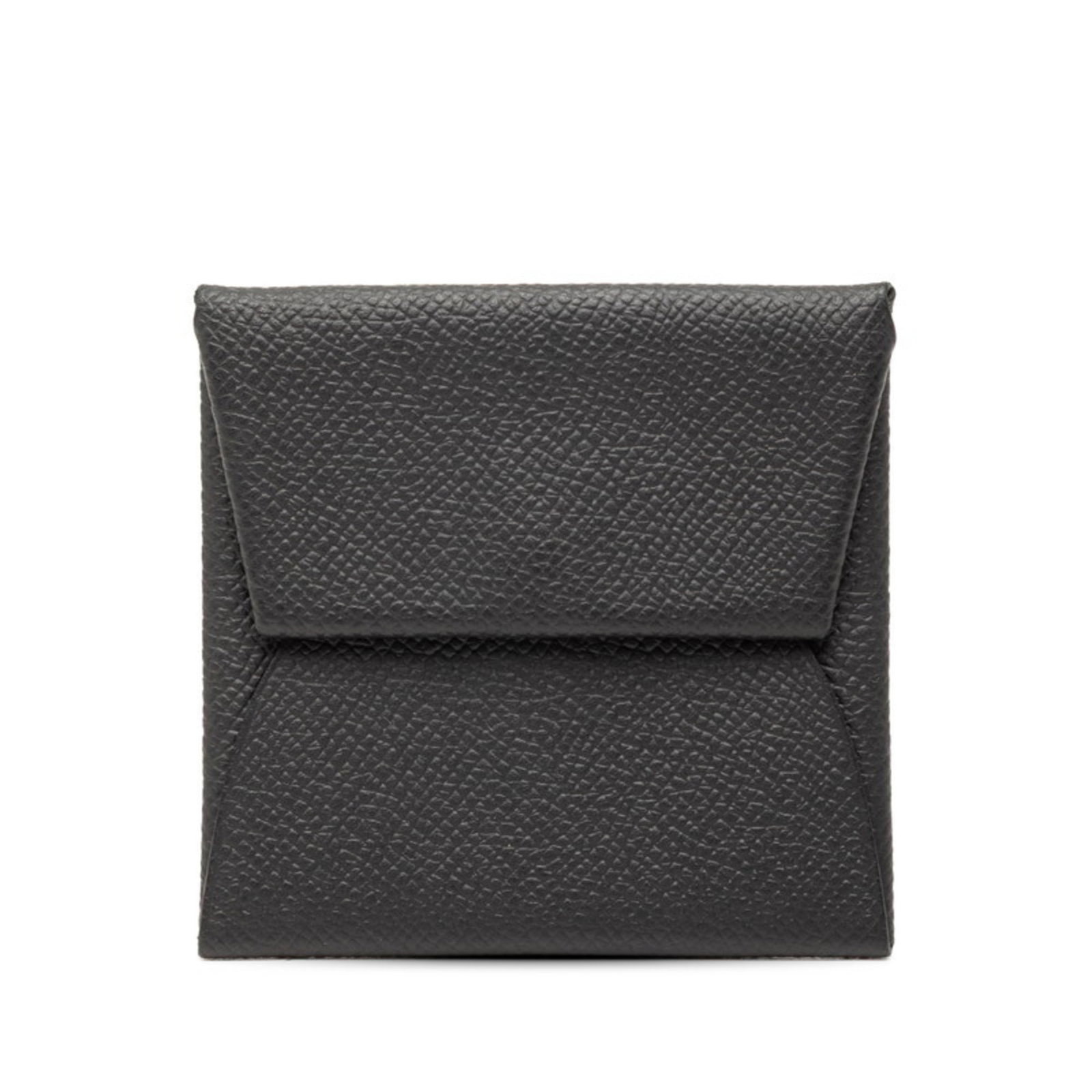 Hermes Coin Purse/ Coin Case Epsom Leather: Hermes Coin Purse/ Coin Case Epsom Leather Epsom leather craftsmanship shines in this sleek black coin purse from the Hermes Bastia line, measuring 8cm x 8.5cm x 1cm. Its compact size and subtle