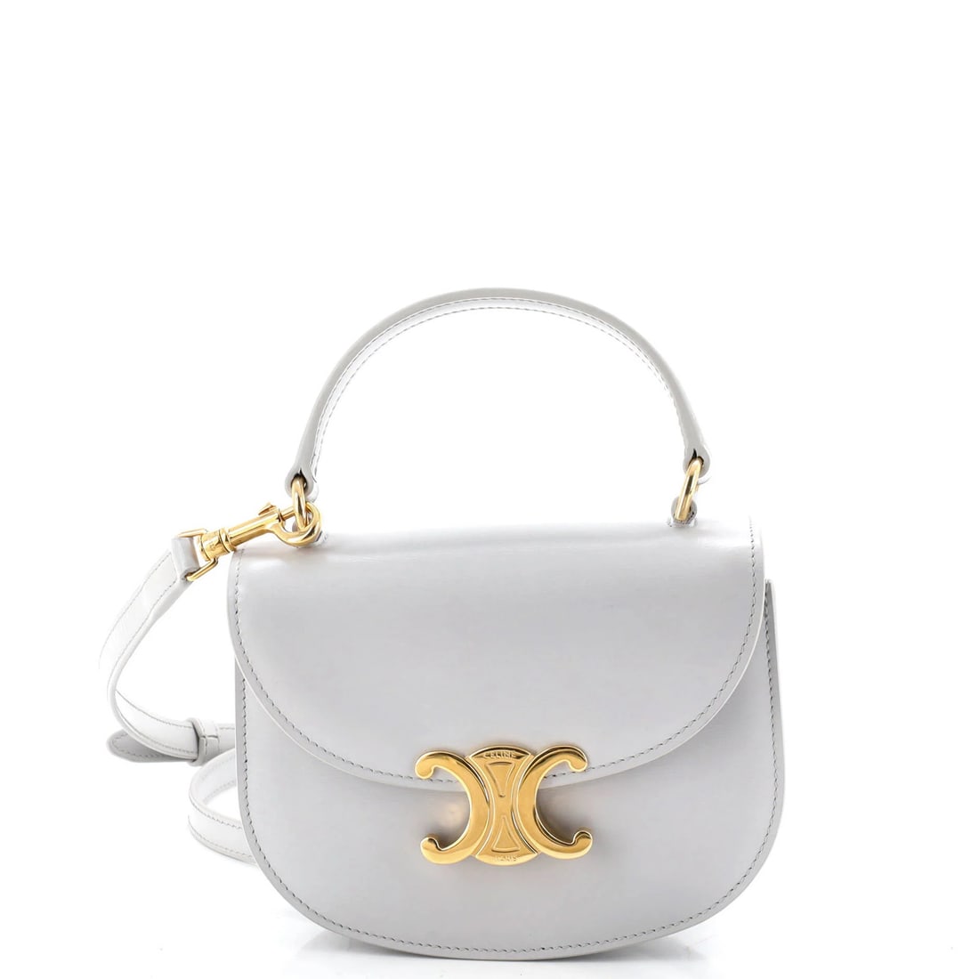 Triomphe Besace Clea Top Handle Bag Leather Mini: Triomphe Besace Clea Top Handle Bag Leather Mini The Triomphe Besace Clea Top Handle Bag Leather Mini is a stylish and compact leather mini bag with a top handle, featuring a gray exterior and matchin