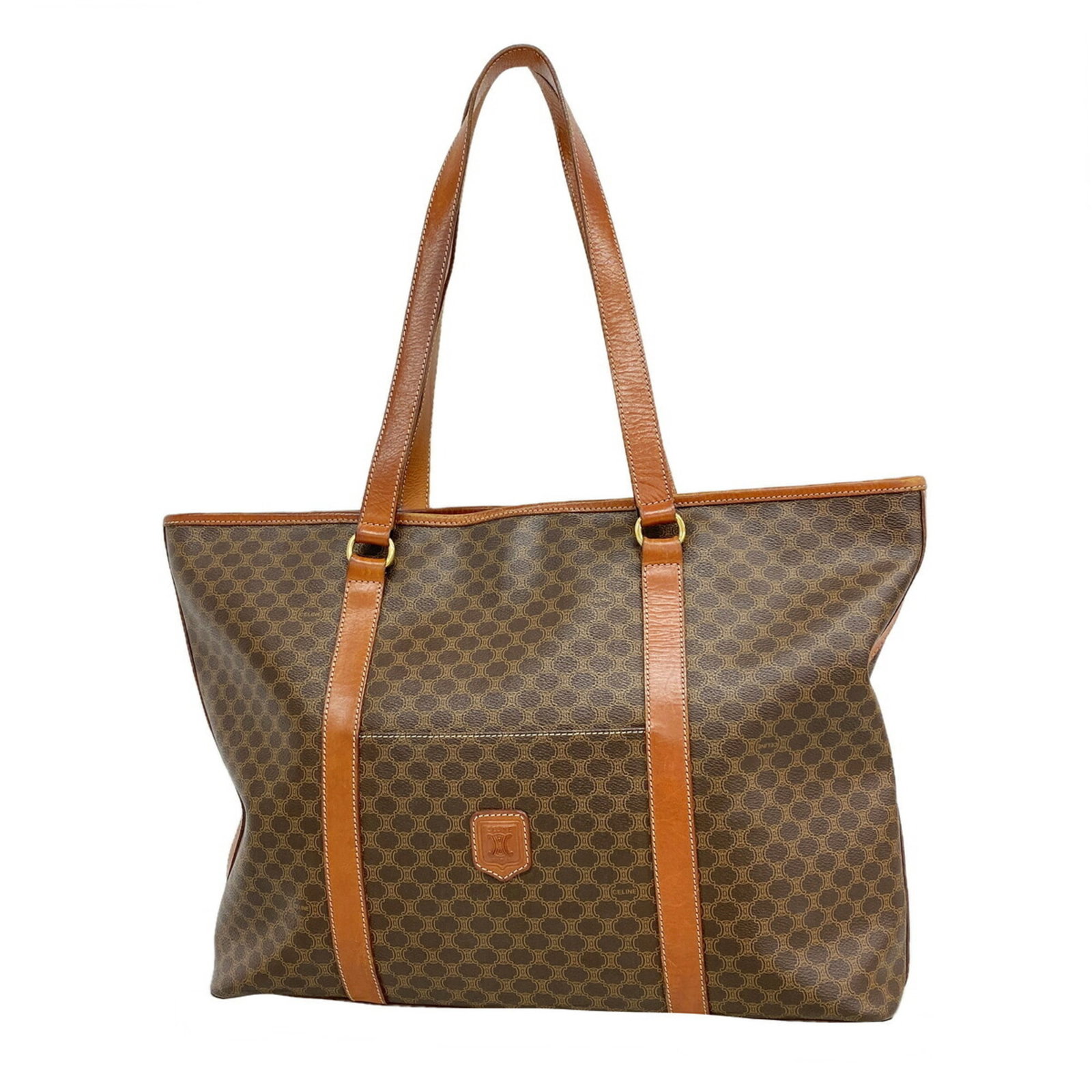 Celine Tote PVC: Celine Tote PVC The Celine Tote PVC is a stylish and durable bag made from high-quality PVC material, featuring a classic brown color and gold hardware details. Measuring 31cm x 40cm x 11cm, it has a