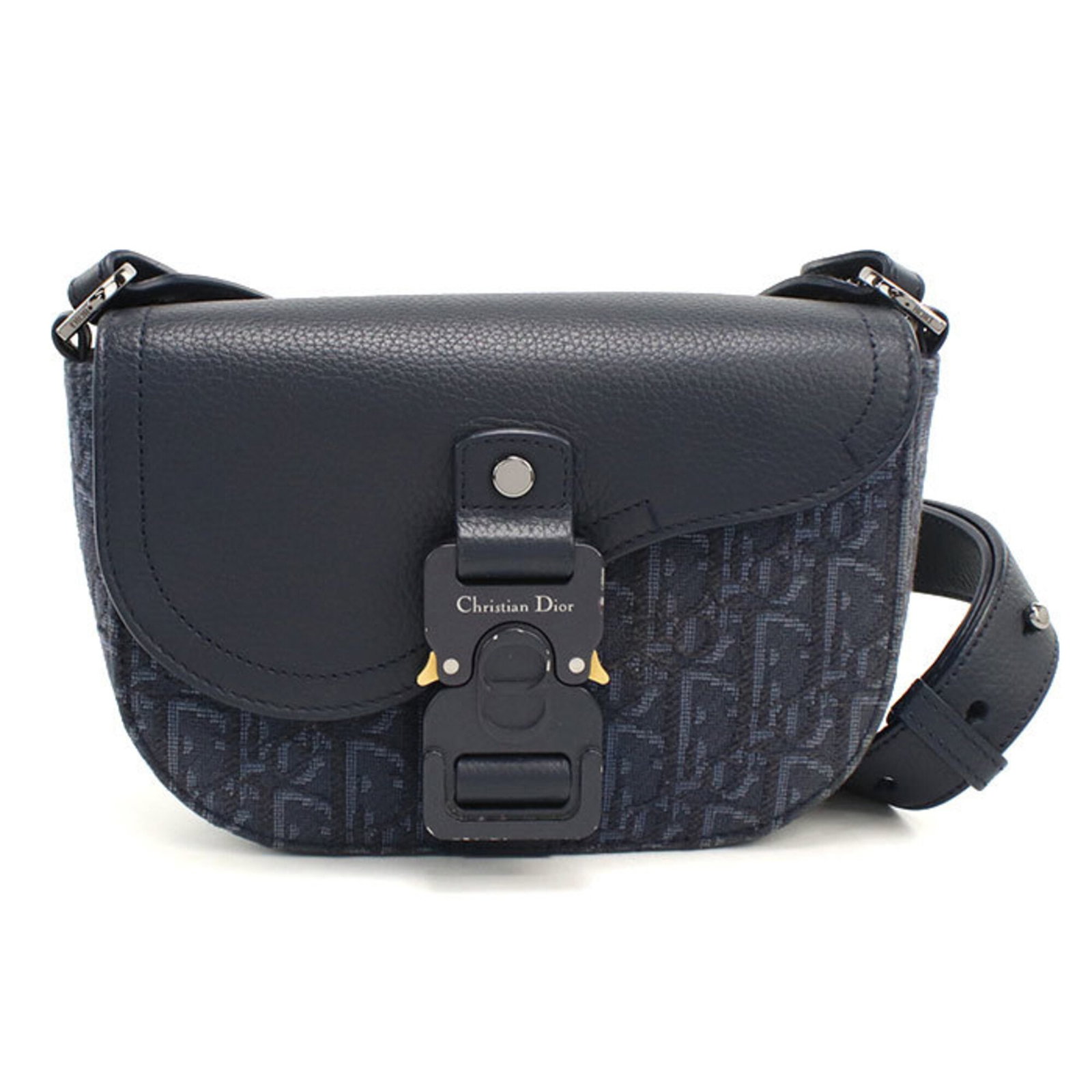 Shoulder Bag by Christian Dior: Shoulder Bag by Christian Dior Navy gunmetal hardware adds a touch of sophistication to this sleek shoulder bag by Christian Dior, measuring 14cm x 16cm x 5.5cm. Made in Italy, this bag boasts a