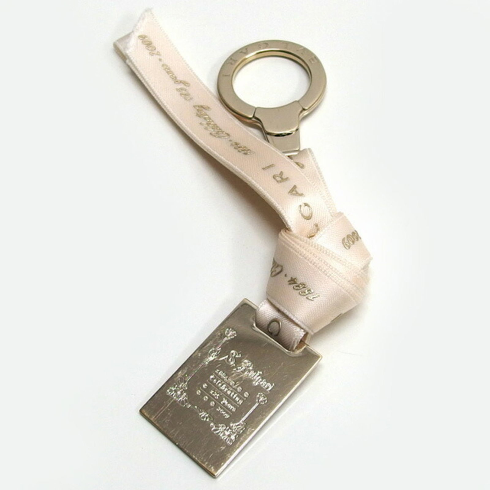Bvlgari Brass Metal Keyring: Bvlgari Brass Metal Keyring Bvlgari Brass Metal Keyring boasts a beautiful champagne gold finish and a sturdy brass metal construction, making it a stylish accessory for everyday use. The keyring's co