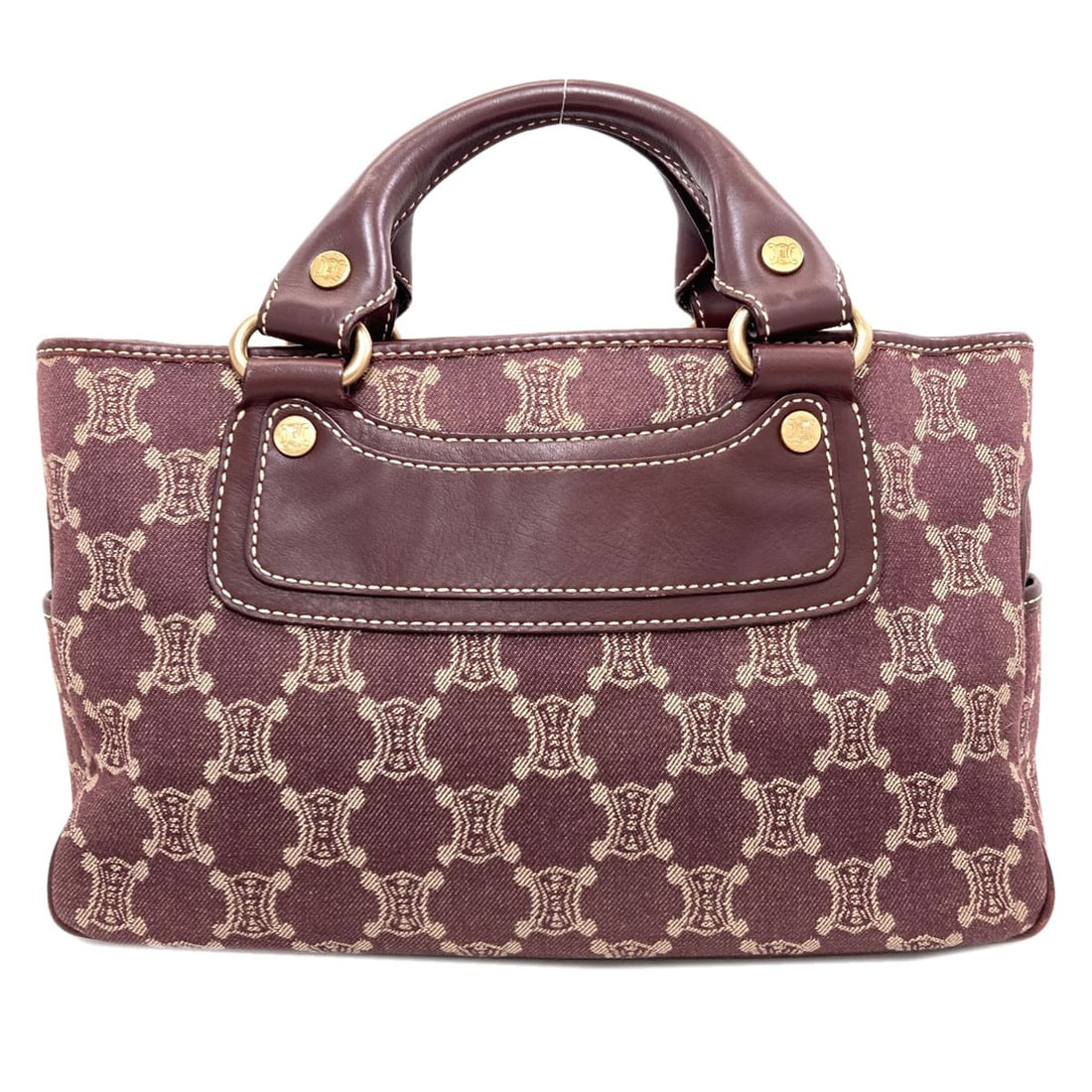 Canvas Handbag Pattern Macadam Celine Boogie Bag: Canvas Handbag Pattern Macadam Celine Boogie Bag Canvas Handbag Pattern Macadam Celine Boogie Bag is a brown canvas handbag with a notable pattern. The bag features a brown exterior made of canvas.
